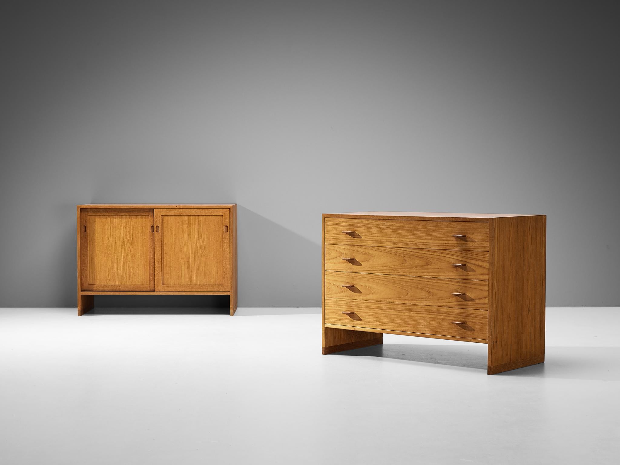 Hans J. Wegner for Ry Møbler, pair of cabinets, model 'RY100', teak, oak, maple, Denmark, 1960

This set consists of two cabinets, each with its own layout and construction. Both are symmetrically structured and defined by the clear lines and the