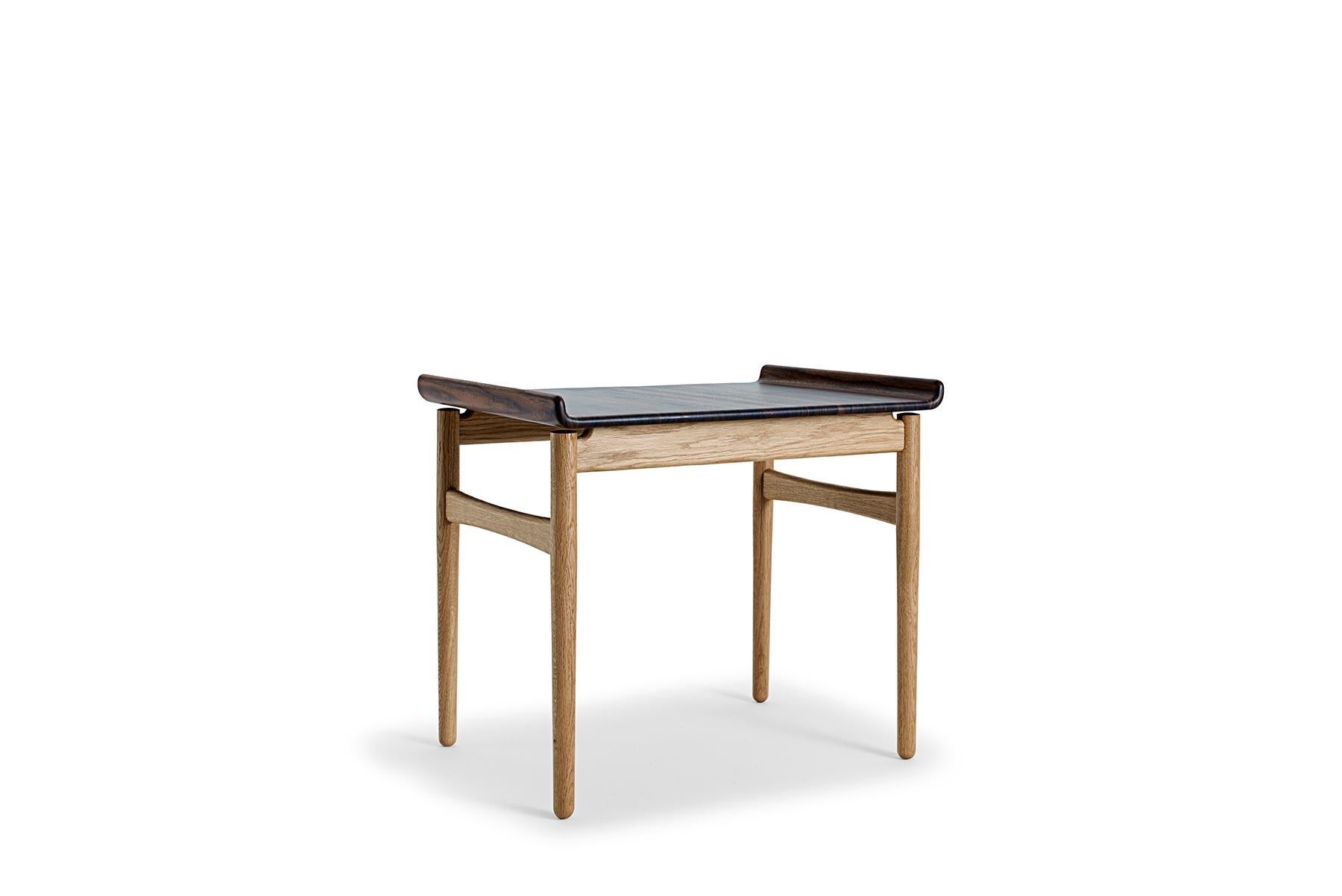 Conçue par Hans Wegner pour GETAMA en 1980, la table basse 83/88 présente un savoir-faire inégalé. Cette table est fabriquée à la main dans l'usine de GETAMA à Gedsted, au Danemark, par des ébénistes qualifiés utilisant des techniques scandinaves