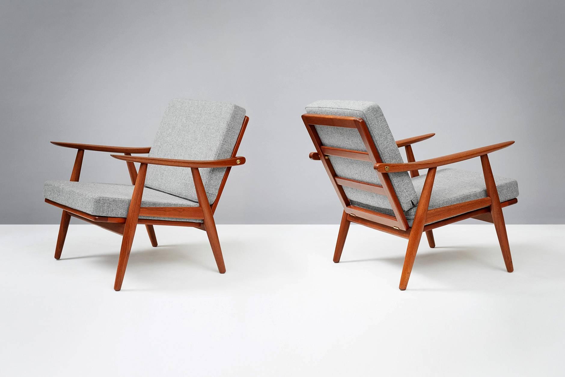 Hans Wegner

GE-270 chair, 1956

Produced by Getama, Gedsted, Denmark. Teak frame with exposed brass fittings. New cushions covered in Kvadrat Hallingdal #130 wool fabric.