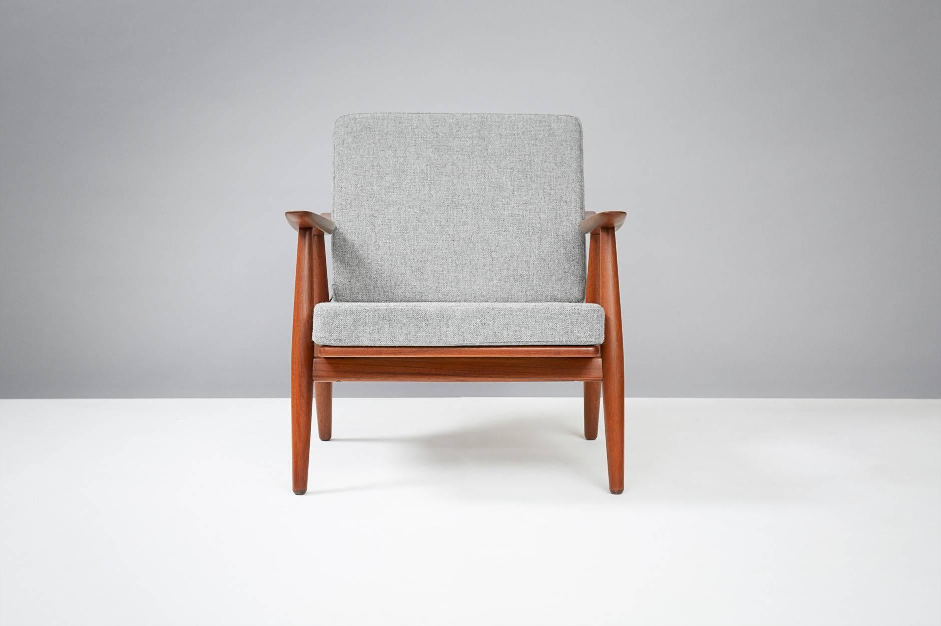 Hans Wegner

GE-270 chair, 1956.

Produced by Getama, Gedsted, Denmark. Teak frame with exposed brass fittings. New cushions covered in Kvadrat Hallingdal #130 wool fabric.