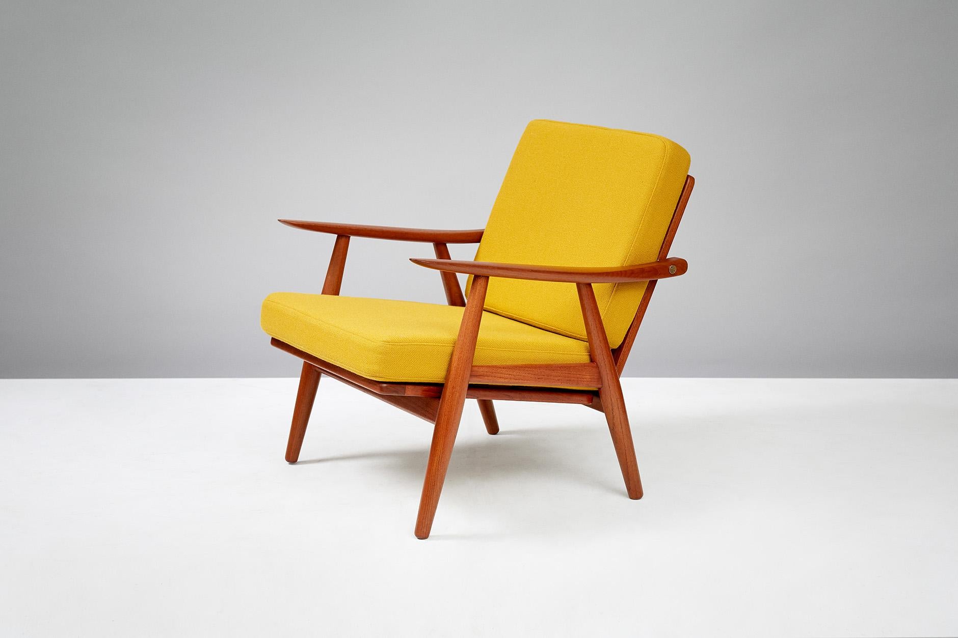 Hans Wegner.

GE-270 chair, 1956.

Produced by Getama, Gedsted, Denmark. Teak frame with exposed brass fittings. New cushions covered in mustard yellow wool fabric from Kvadrat. 

 

