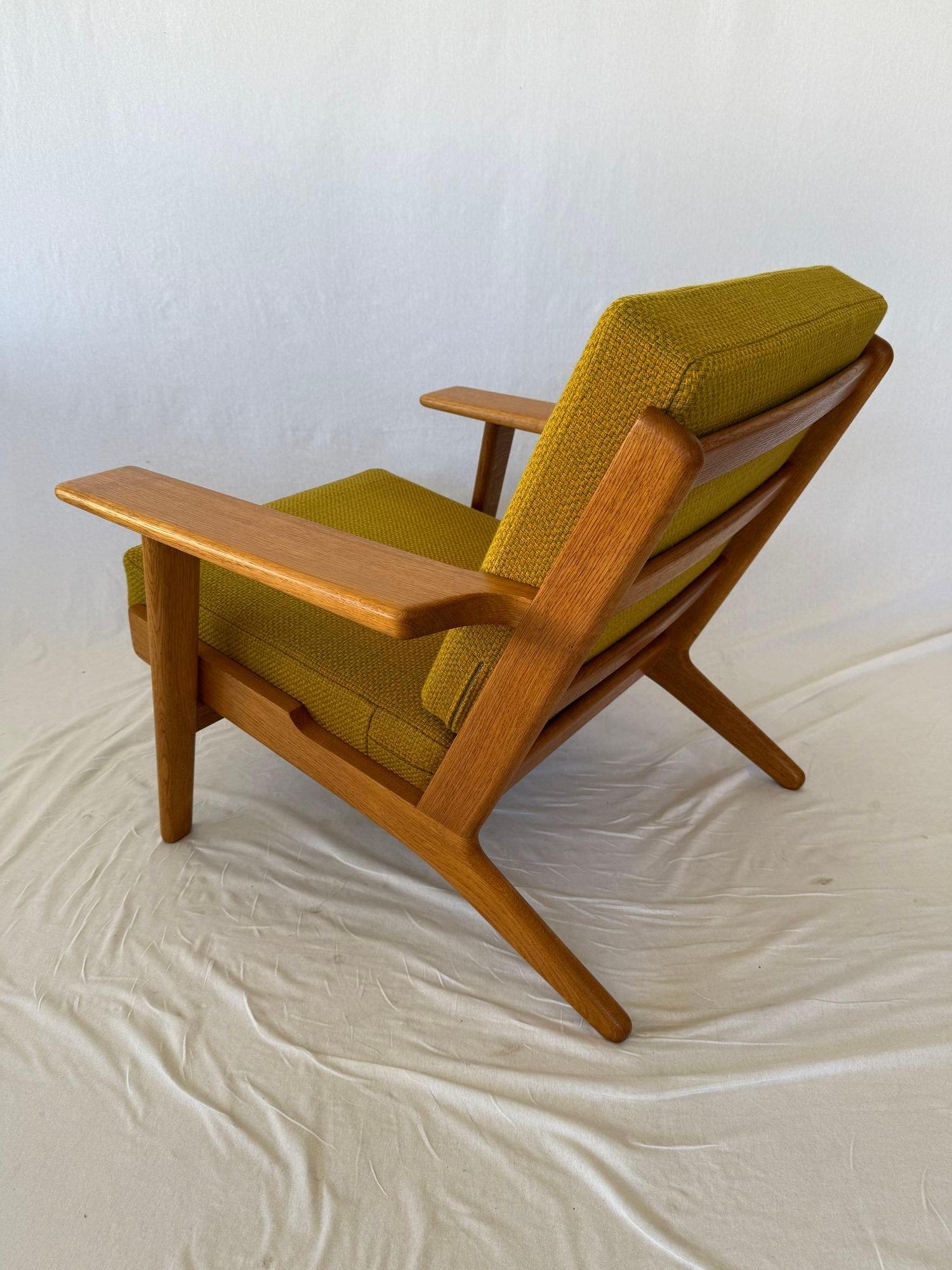 Hans Wegner GE-290 Lounge Chair designed in 1953 and produced by GETAMA. Signed mark to wood underneath.