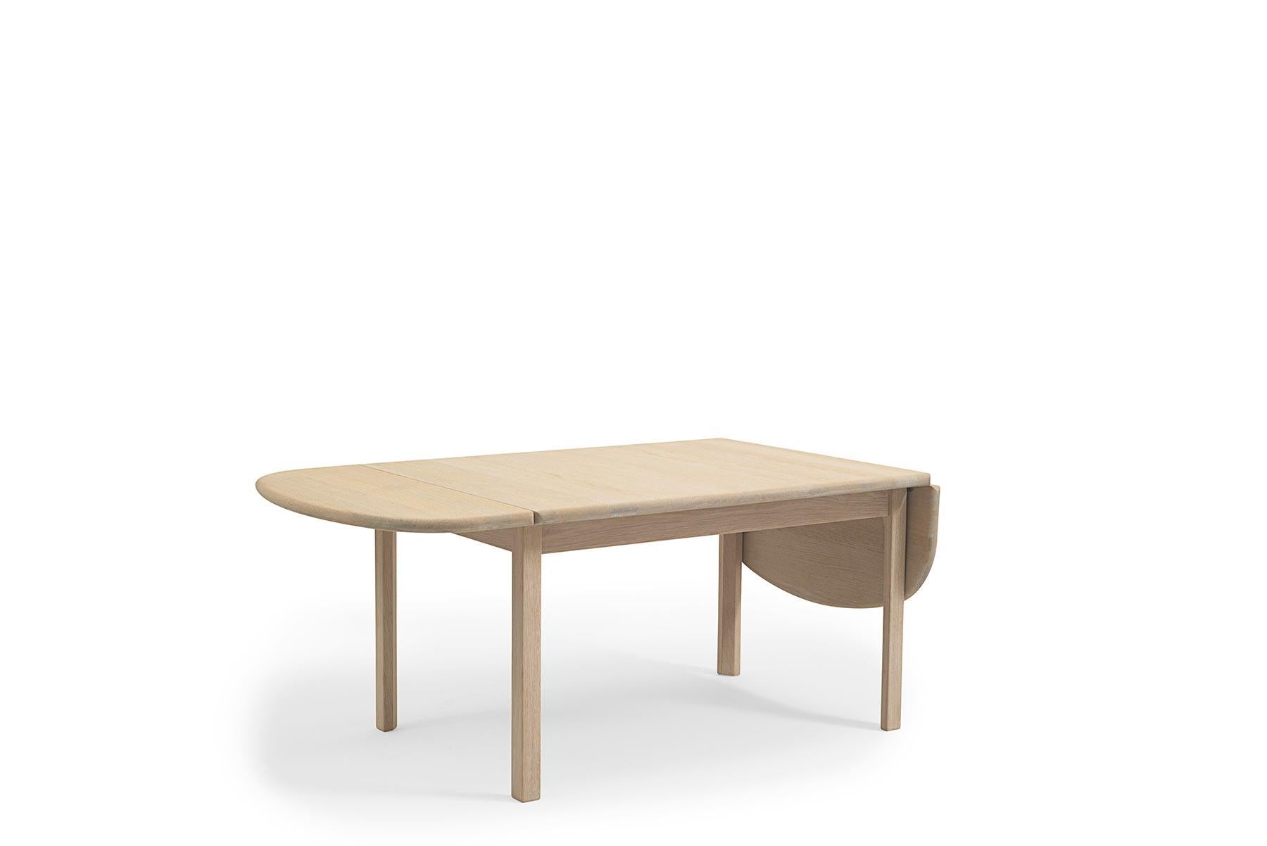 Designed by Hans Wegner for GETAMA in 1980, the 82/85 coffee table features unparalleled craftsmanship. Table offers two drop leaves which extend the table surface. This table is hand built at GETAMA’s factory in Gedsted, Denmark by skilled
