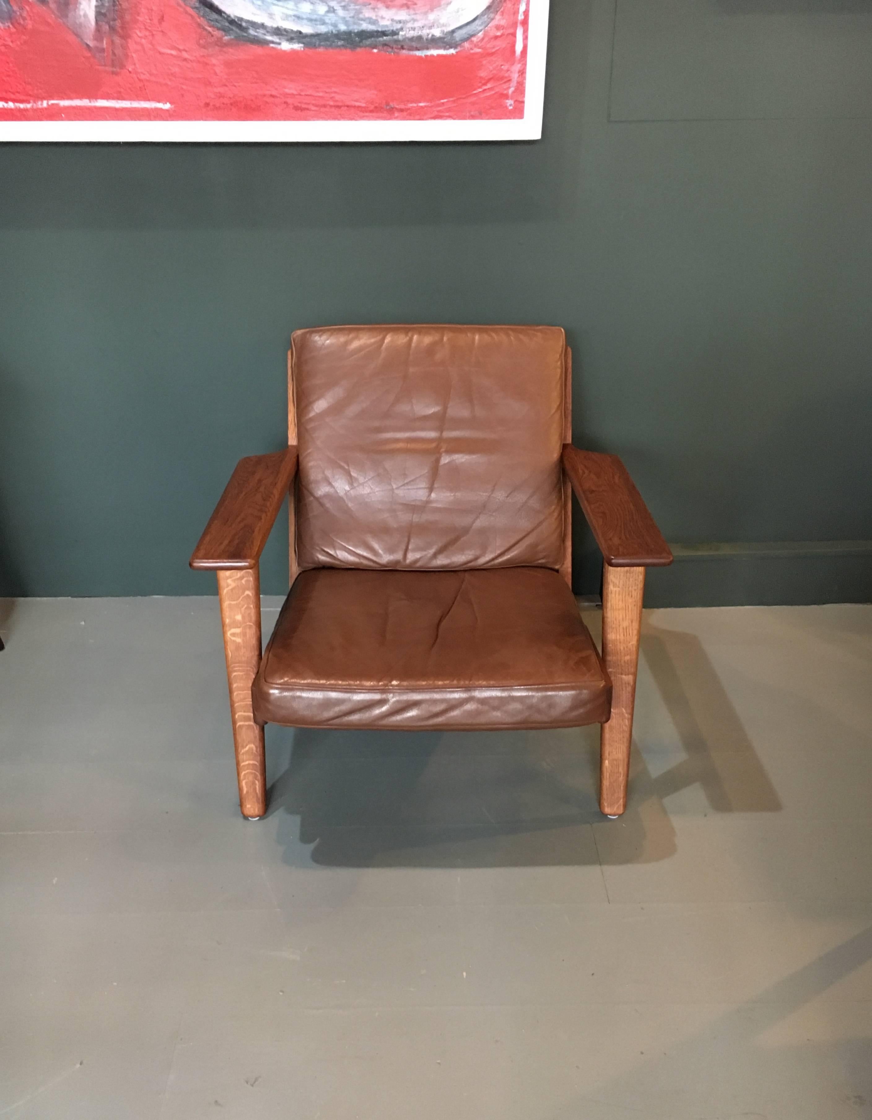 The Classic GE290 lounge chair by Danish master designer Hans J Wegner. These are original, 1950s models (several available) from GETAMA, Denmark. Sympathetically refurbished European oak frames with original leather upholstery - however, we do