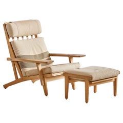 Hans Wegner Getama 375 Lounge chair with Ottoman in Solid Oak and Wool