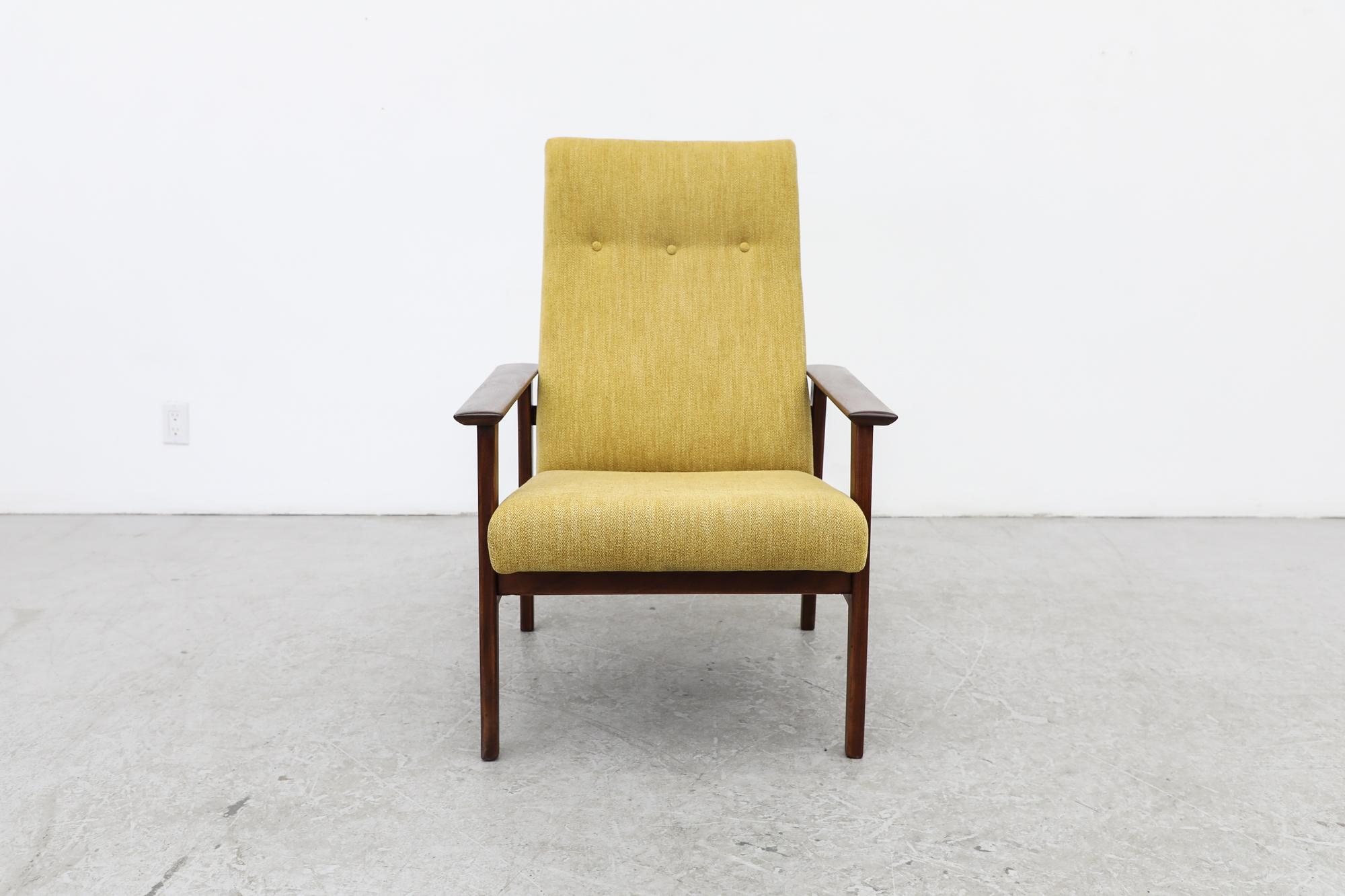 Mid-century Hans Wegner inspired Danish teak lounge chair with newer saffron upholstery. The solid teak frame is in original condition with normal signs of use including some scratches and scuffs. Wear is consistent with its age and use.