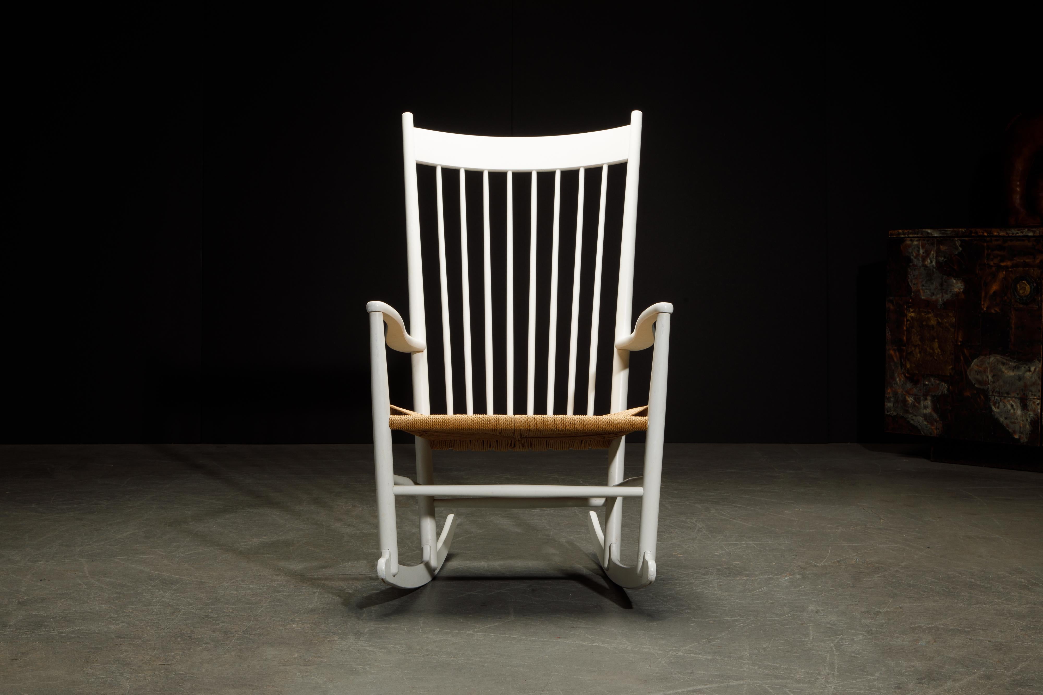 This classic Hans Wegner 'J-16' Rocking Chair for Fredericia was originally designed in 1944 (Denmark) with sensually curved arms inspired by traditional Windsor and Shaker furniture, fused with Wegner’s signature lines.

This Wegner J 16 example