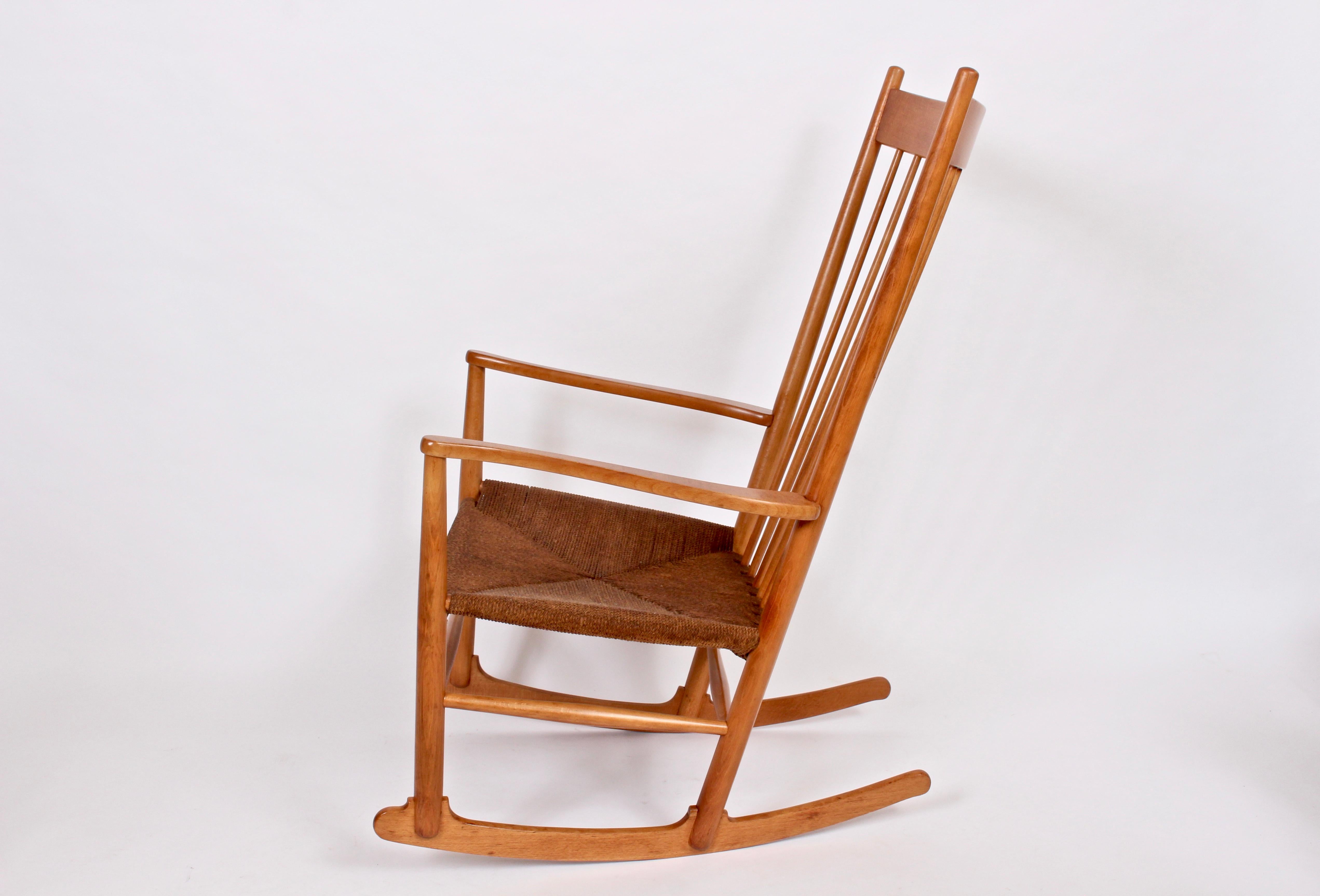 Hans Wegner for FDB Mobler spindle back rocker, 1944 designed. Featuring Beech framework with 3 ply Hemp cord seat. Comfortable. Danish Modern. Classic. Additional shipping methods may be available, please inquire
  
