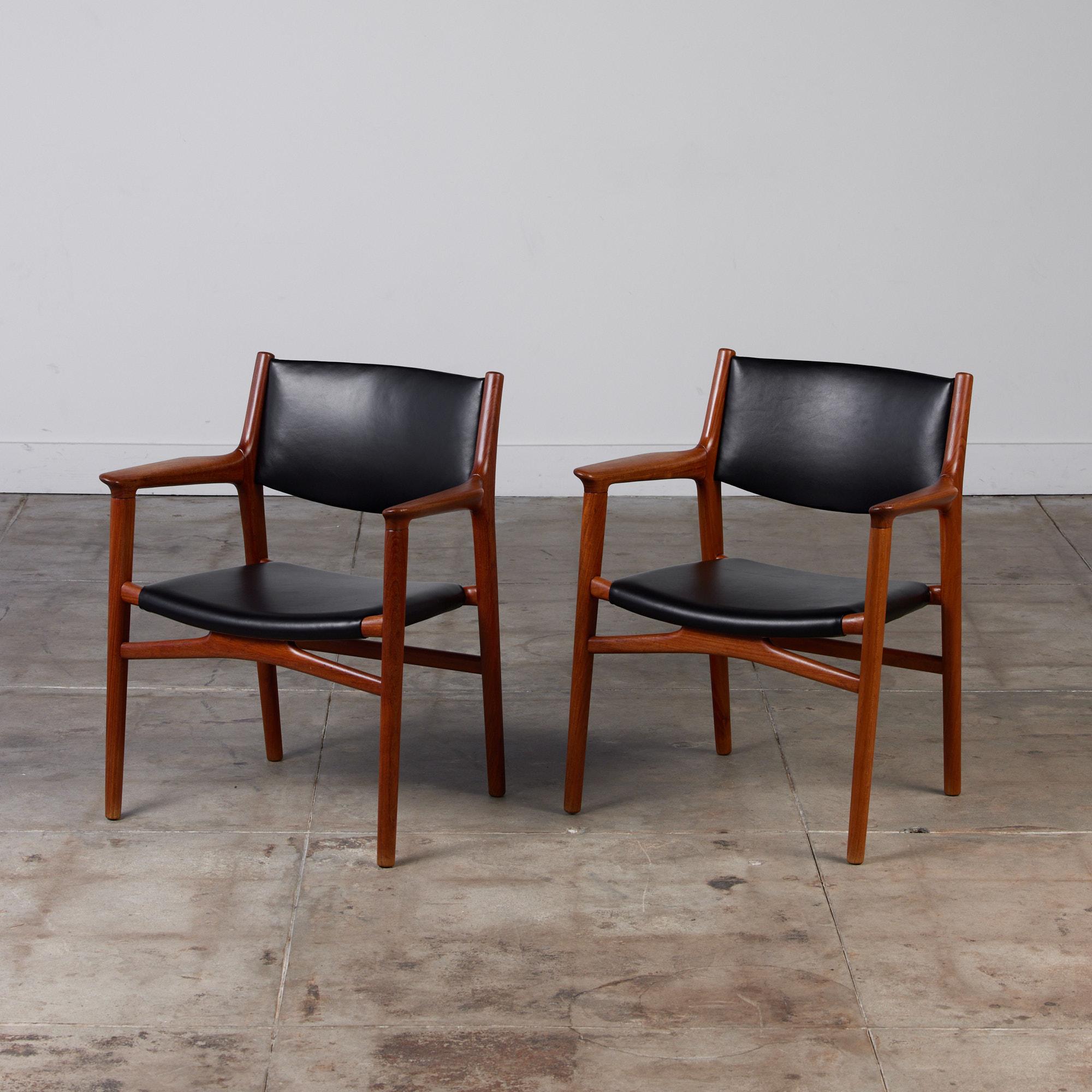 Hans J. Wegner teak armchair c.1950s, Denmark, for Johannes Hansen. The rare model JH-515 features a black leather backrest and seat.

Stamped Johannes Hansen, COPENHAGEN, DENMARK.

Two chairs available; they are priced
