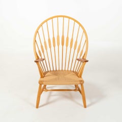 Hans Wegner JH50 “Peacock Chair” in Oak and Teak