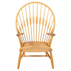 Hans Wegner JH50 “Peacock Chair” in Oak and Teak