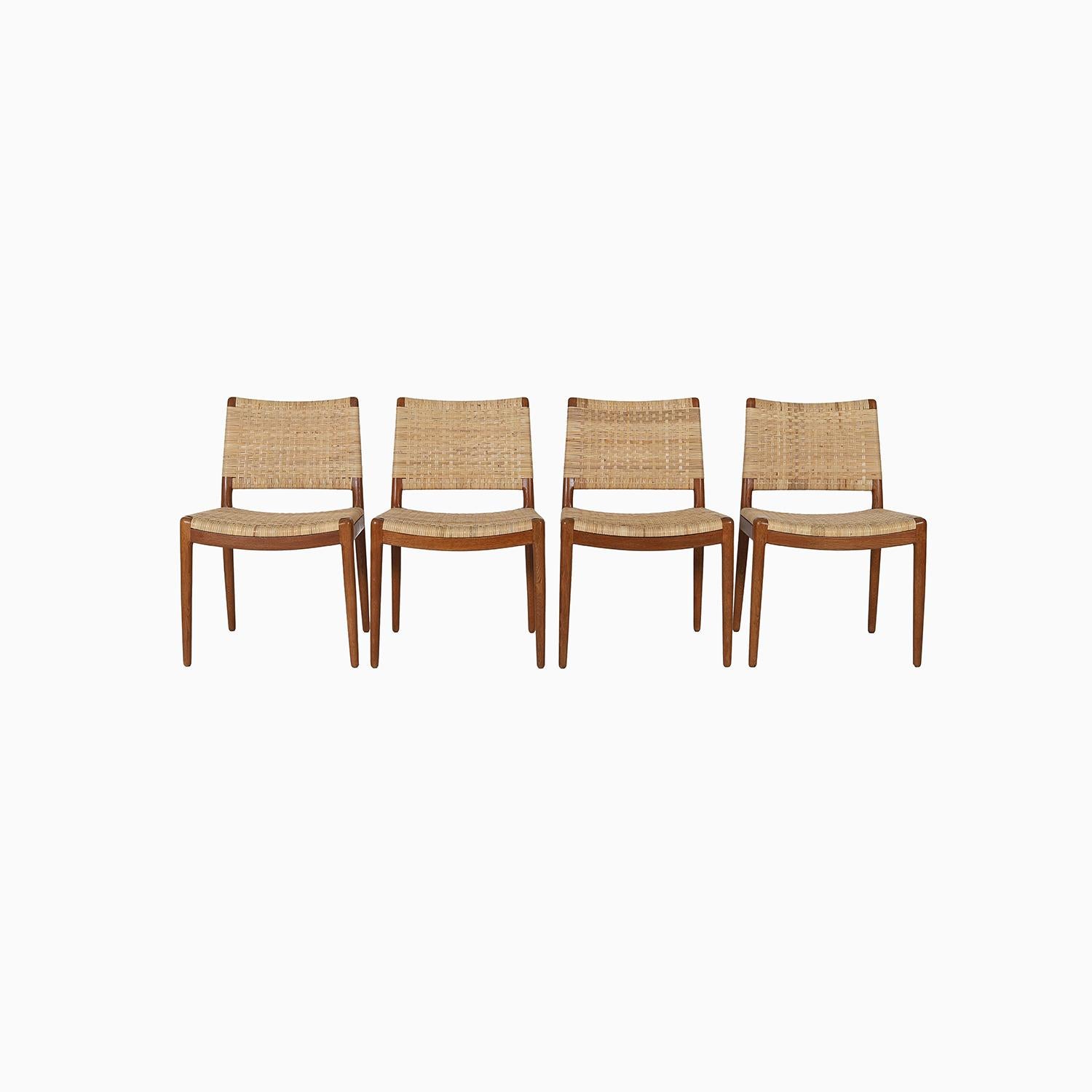 A spectacular and rare set of four oak dining chairs by Hans J. Wegner for Johannes Hansen.   A new application of cane, in the original weave.   Oiled oak frames have a rich patina.  



Professional, skilled furniture restoration is an integral