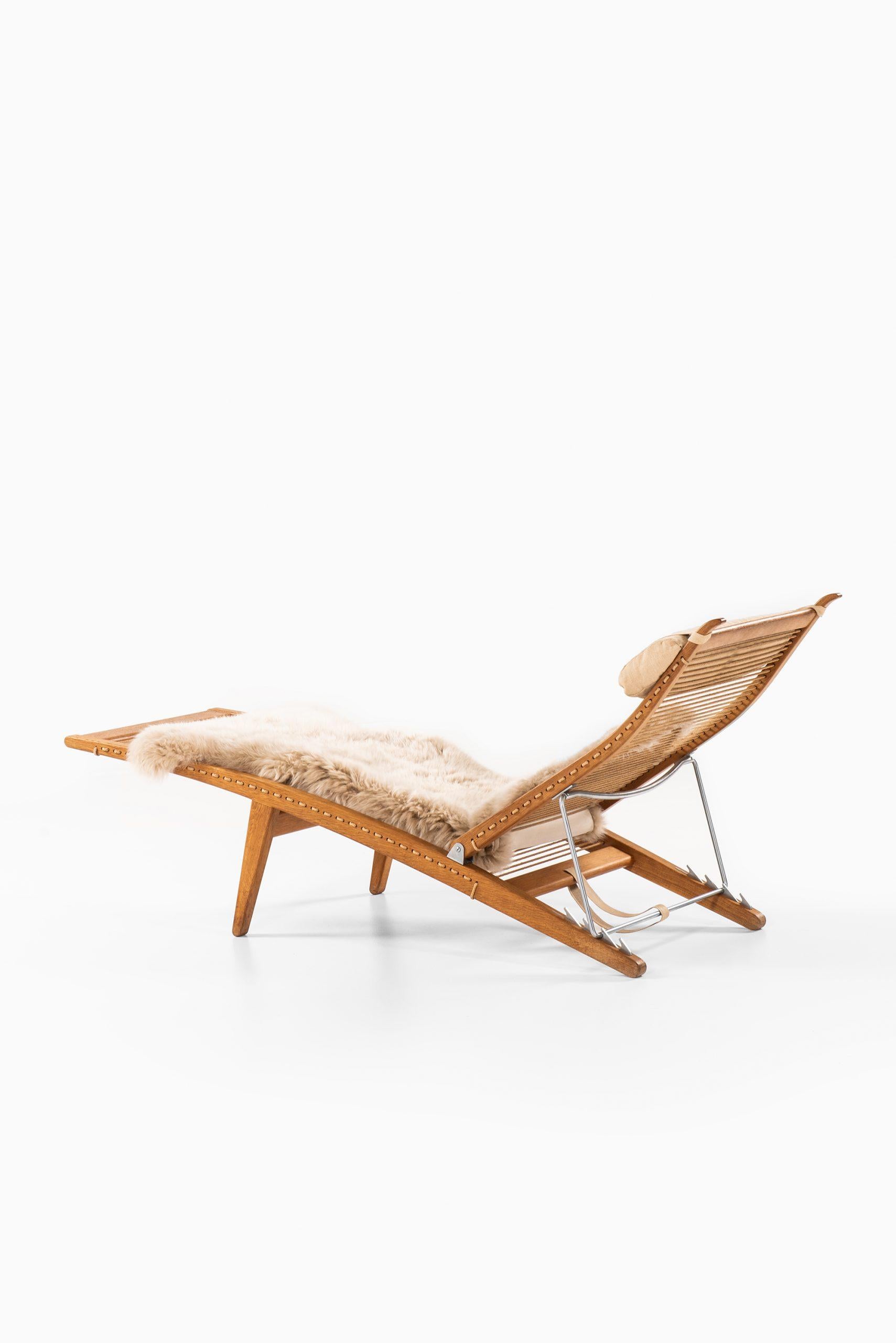 Metal Hans Wegner Lounge Chair Model JH-524 by Cabinetmaker Johannes Hansen in Denmark