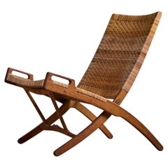 Hans Wegner, Lounge Chair, Oak, Rattan, Brass, Denmark, 1950s