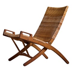 Hans Wegner, Lounge Chair, Oak, Rattan, Brass, Denmark, 1950s
