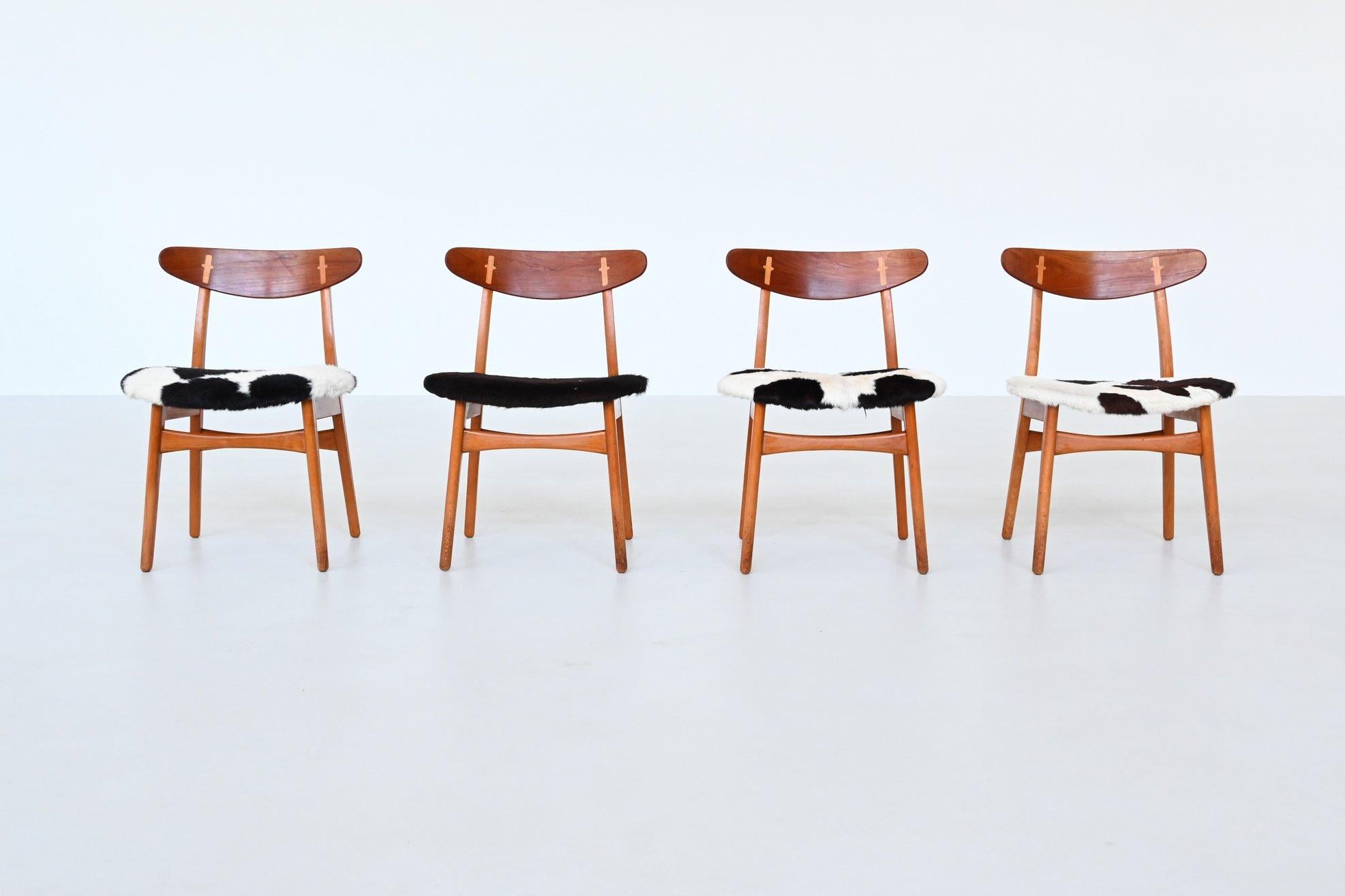 Erstaunlicher Satz von vier ikonischen Esszimmerstühlen des Modells CH30, entworfen von Hans J. Wegner und hergestellt von Carl Hansen & Søn, Dänemark 1952. Dieser Designklassiker zeichnet sich durch organische, sinnliche Konturen und eine elegante