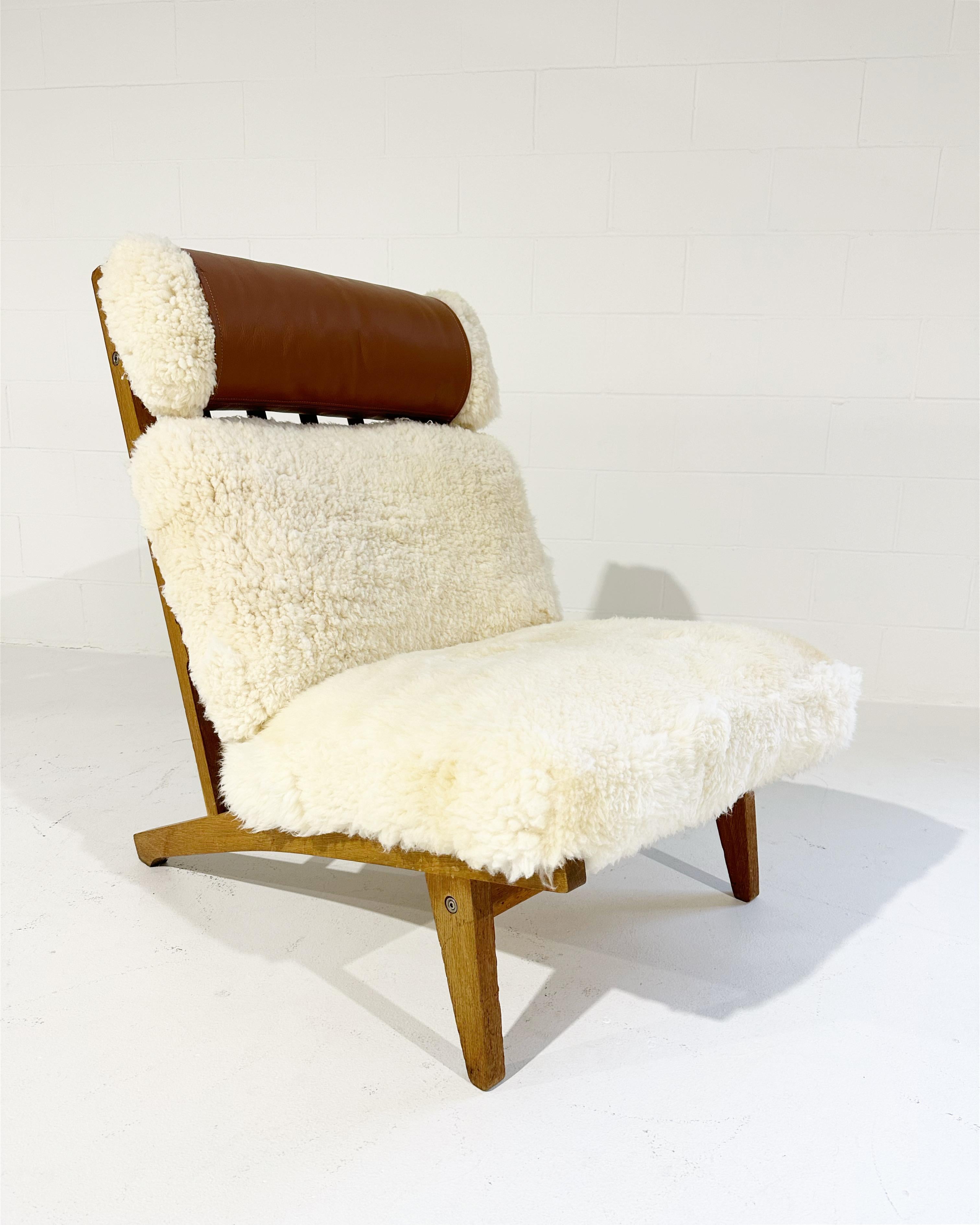 With gorgeous patinaed oak, custom California sheepskin cushions, and a finishing touch of beautiful Loro Piana leather, this Hans Wegner lounge chair is incredible. And so comfortable. 
