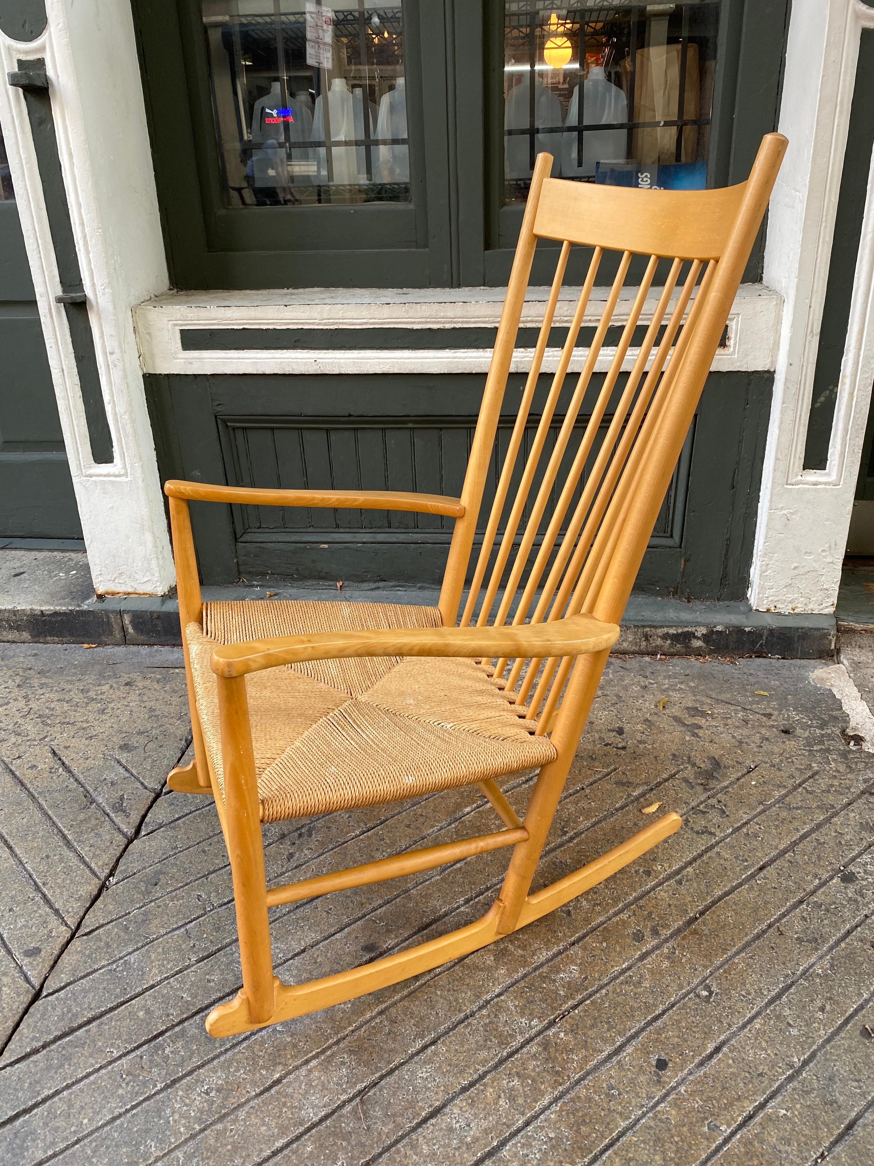 Hans Wegner Model J16 rocking chair in beech with it's original papercord seat. Seat shows slight spots from use, but overall solid and pretty clean! Beautiful high back rocker, all original!