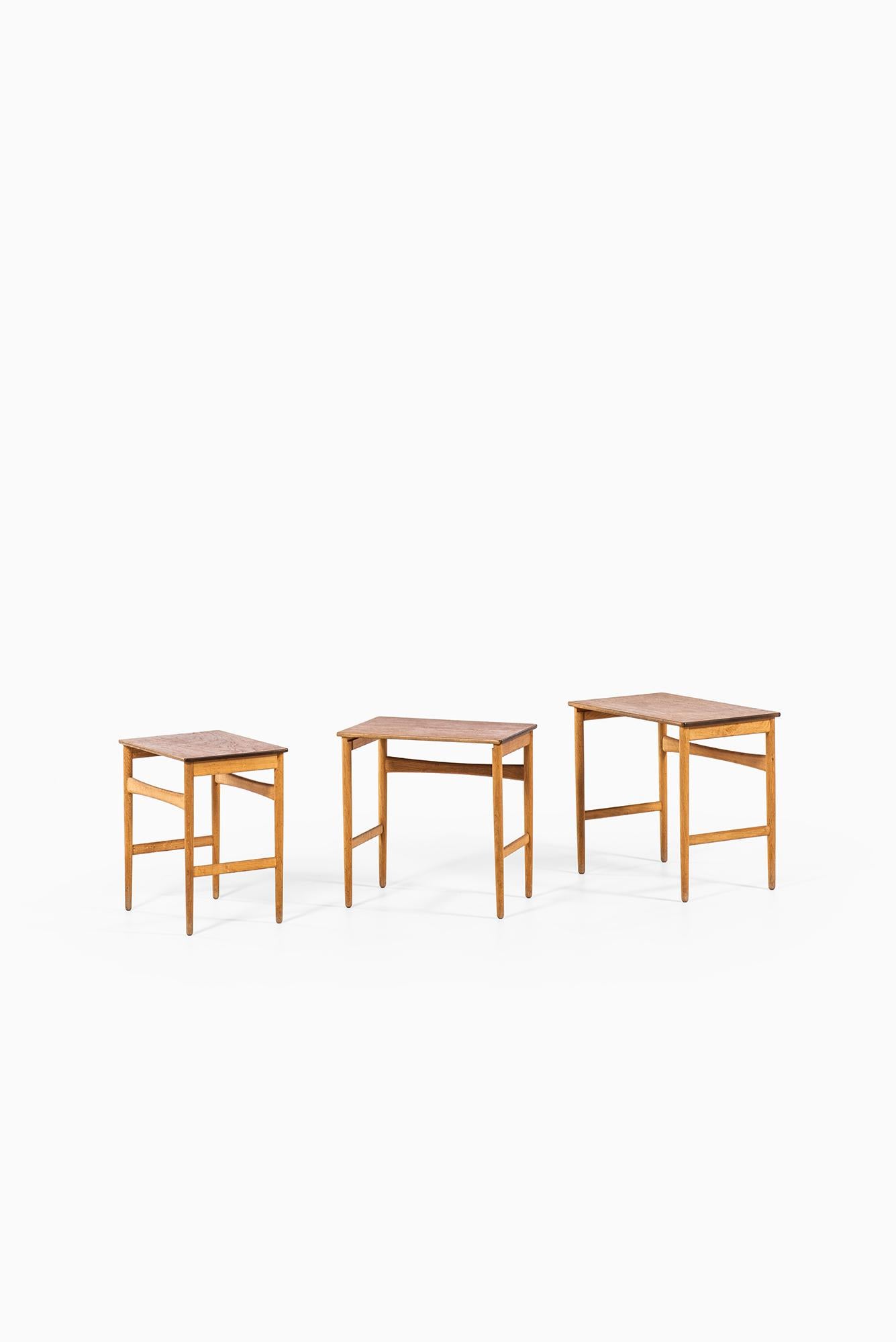 Mid-20th Century Hans Wegner Nesting Tables in Oak and Teak by Andreas Tuck in Denmark