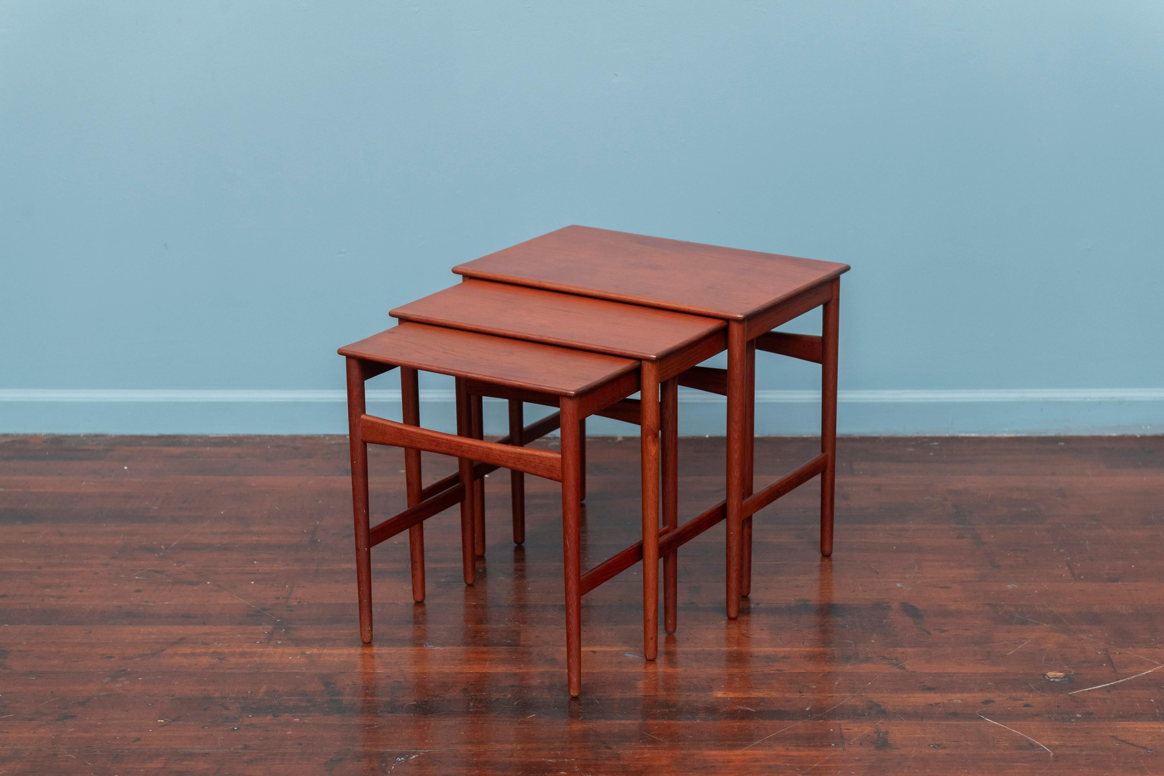 Hans Wegner design nesting tables, Model AT-40 for Andreas Tuck. High quality construction and materials, using solid teak with rounded edges. Simple yet sophisticated design that is very practical and well made.
 Newly refinished, stamped and ready