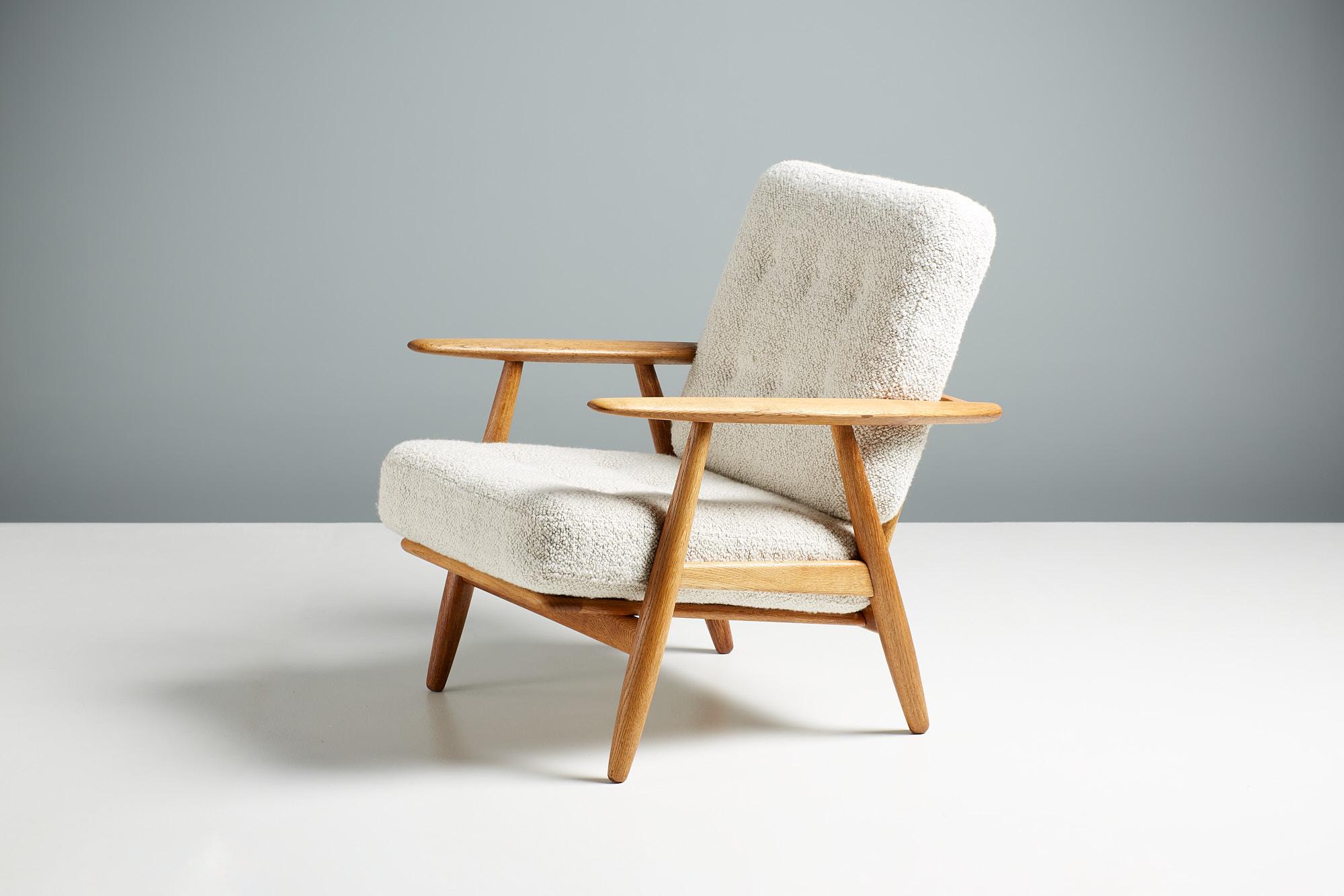 Hans Wegner Cigar Chair Model GE-240

Produced by Getama in Denmark, c1950s. The Cigar chair remains one of Wegner's most effective, contemporary and popular designs. 

This example has a carefully refinished oak frame with sprung cushions
