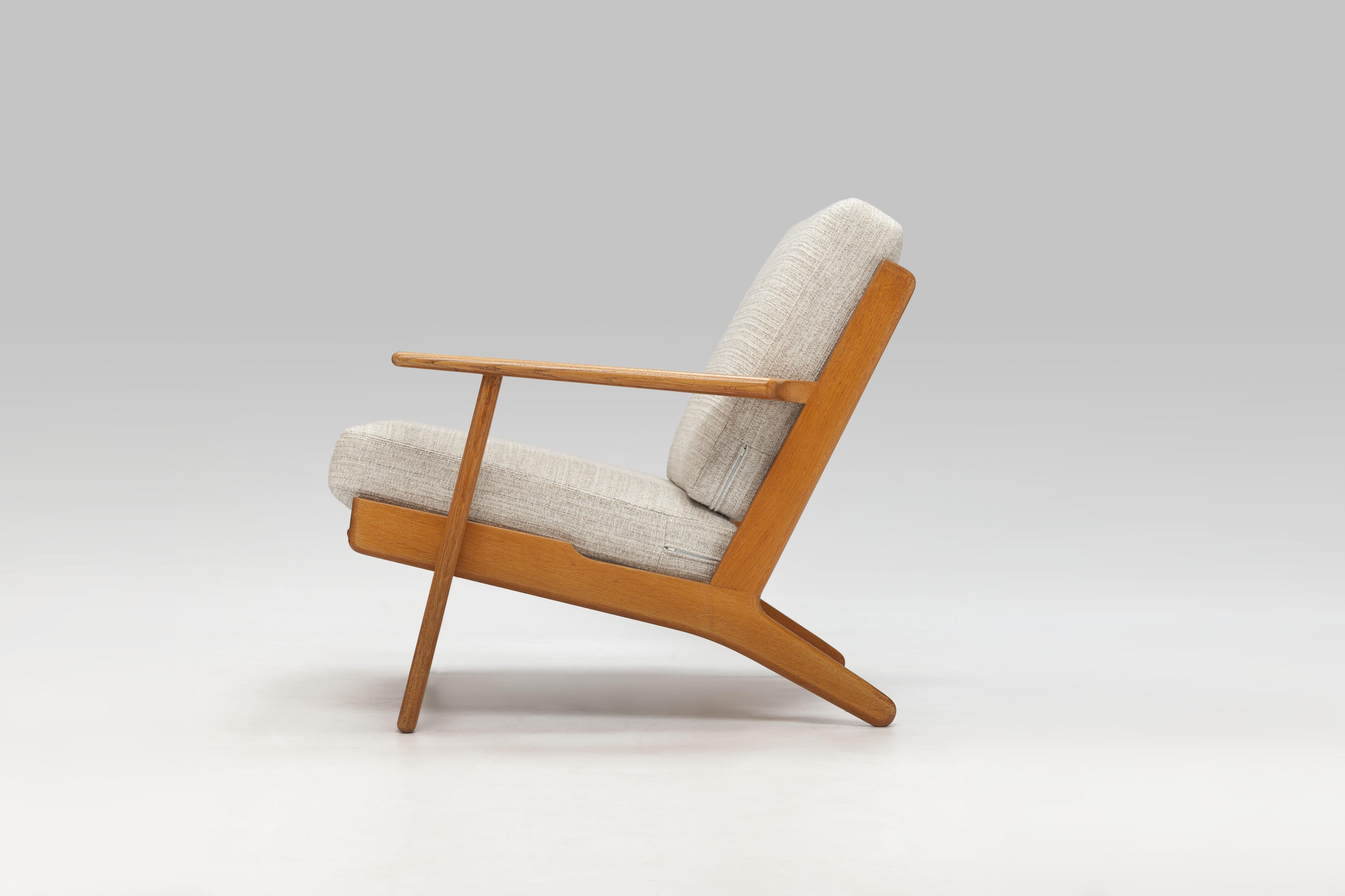 Scandinavian Modern Hans Wegner Oak Lounge Chair GE290 by GETAMA - 2 Pieces Available