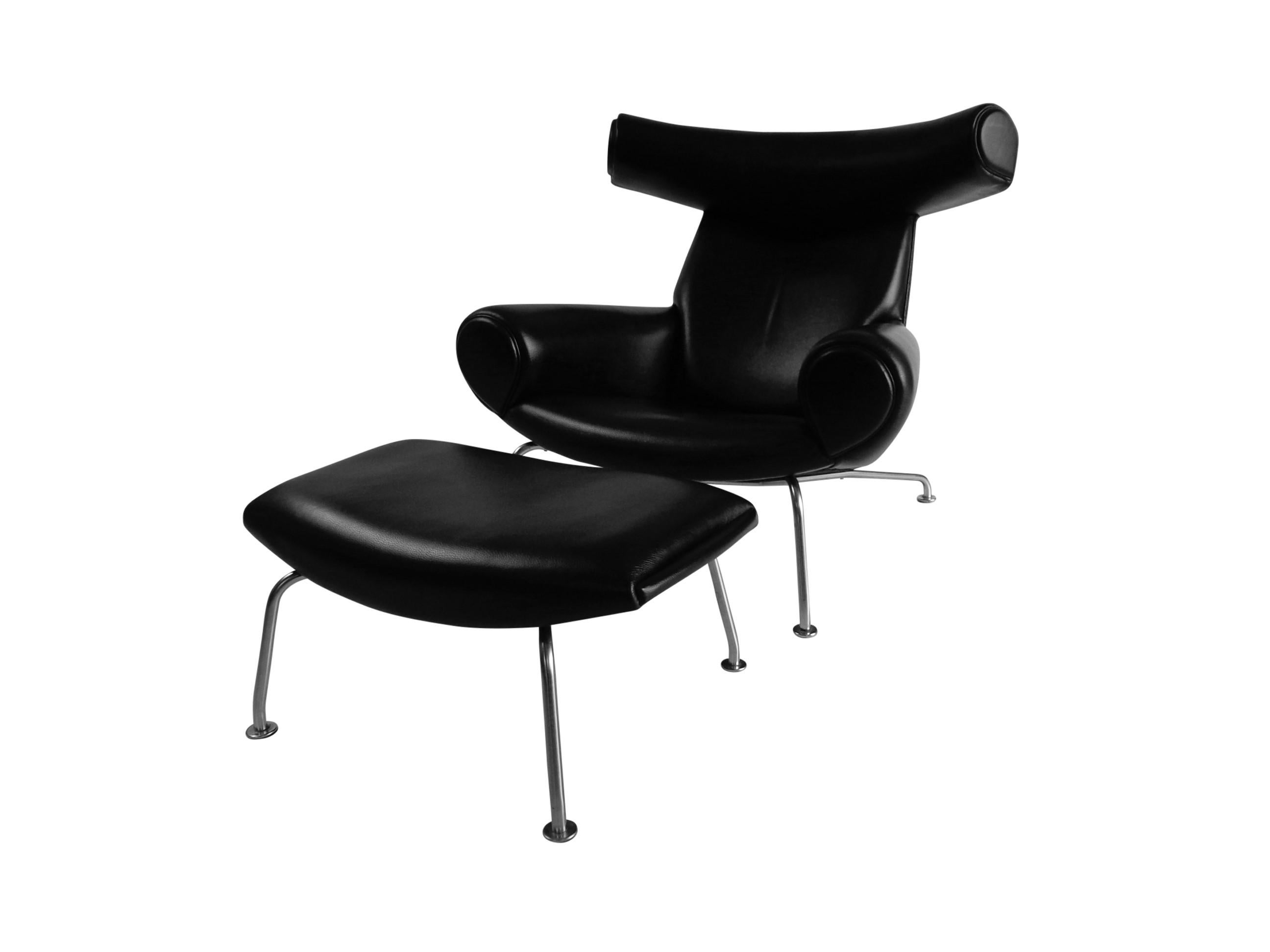 Hans Wegner, the Ox chair AP 46 and stool AP 49 in black leather by AP-Stolen, Denmark. One of Hans Wegner’s most important chairs, this piece was created as an extension of the ideas used in the Cow Horn Chair and the Bull Horn Chair. Its Special