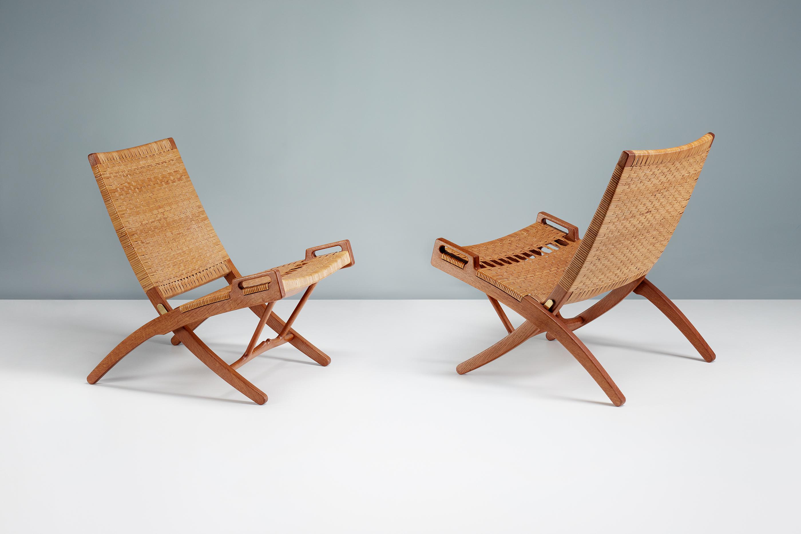 Hans Wegner JH-512 Folding Chairs, Oak

One of Danish master Hans J. Wegner's most important and iconic works. The Model 512 chair was produced by master cabinetmaker Johannes Hansen in Copenhagen during their golden period of collaboration that