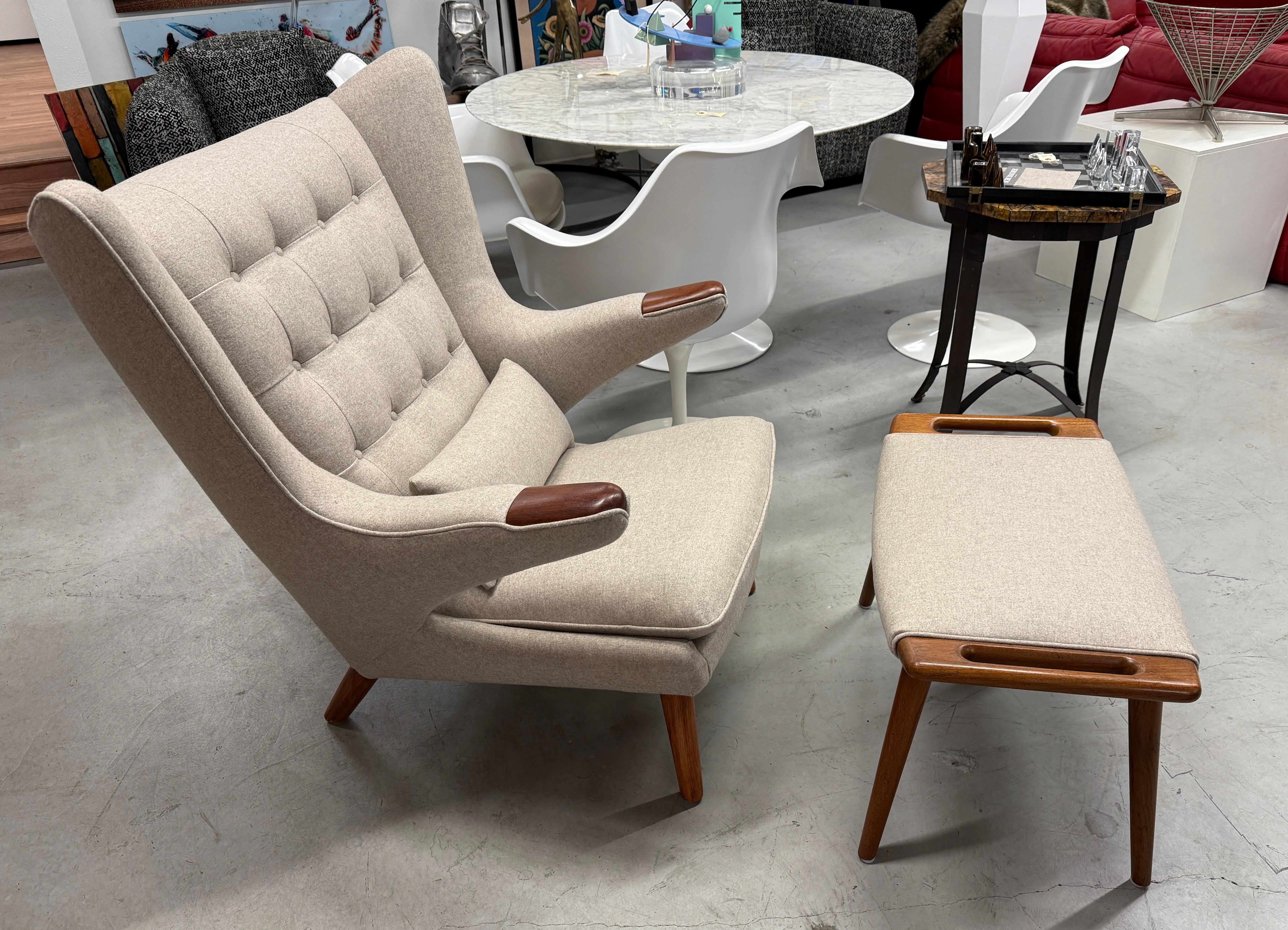 A beautifully redone Papa Bear Chair and Ottoman by Hans Wegner. The chair was found in a lovely Palm Springs Estate. We chose a wonderful Schumacher Chester Wool in  Greige color. The fabric is 80% wool and 20% polyamide. It was made in Italy.  The