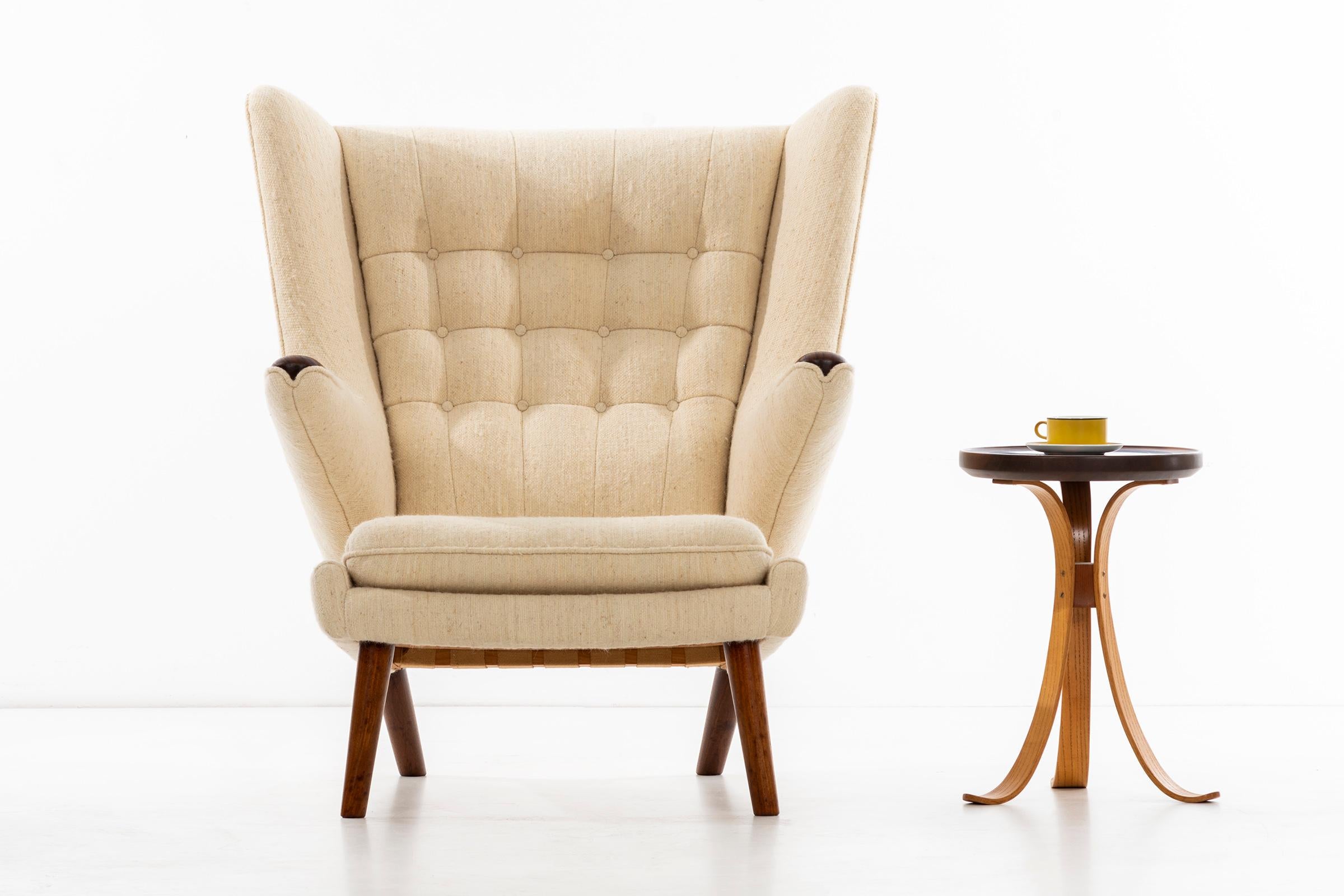 Hans Wegner Papa Bear lounge chair and ottoman, manufactured by A.P.Stolen.
This chair has been expertly recovered in vintage dead-stock Margit Pinter undyed wool upholstery fabric, sourced by Interior architects Powell/ Kleinschmidt, handwoven by
