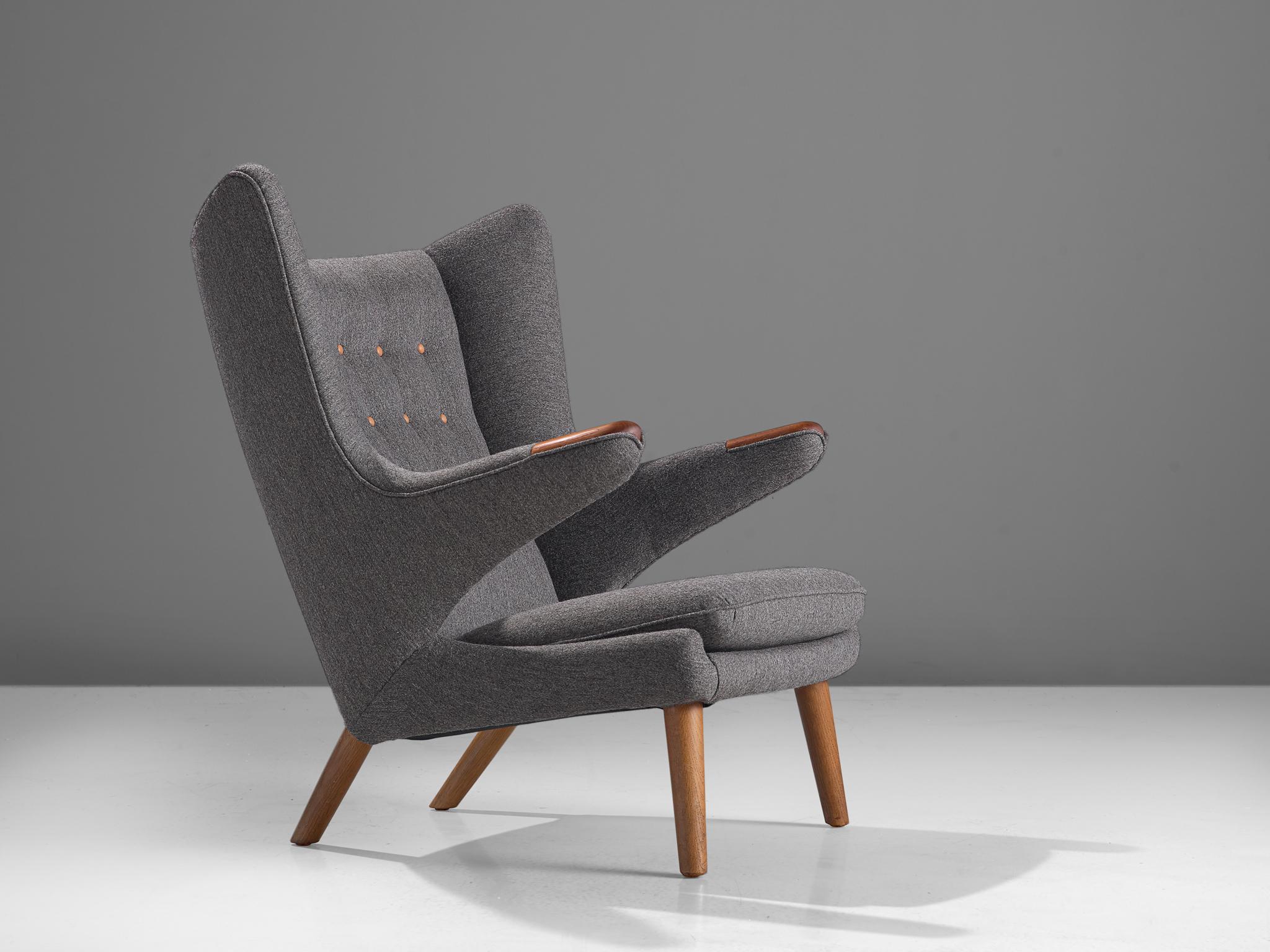 Hans J. Wegner, lounge chair Model AP 19 'Papa Bear, fabric and oak, Denmark, 1951 design, production later, 

This semi-wingback armchair, has an open expression in contrast with its historical ancestors. Wegner made a few considerations about