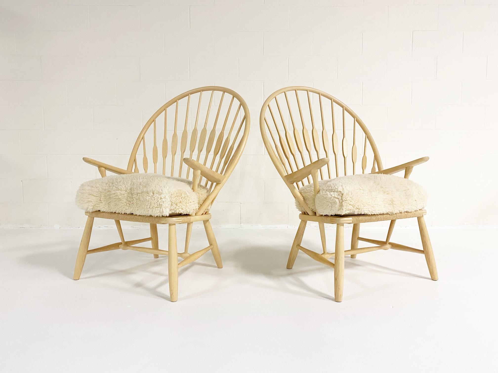 20th Century Hans Wegner Peacock Lounge Chairs with Custom Sheepskin Cushions, Pair