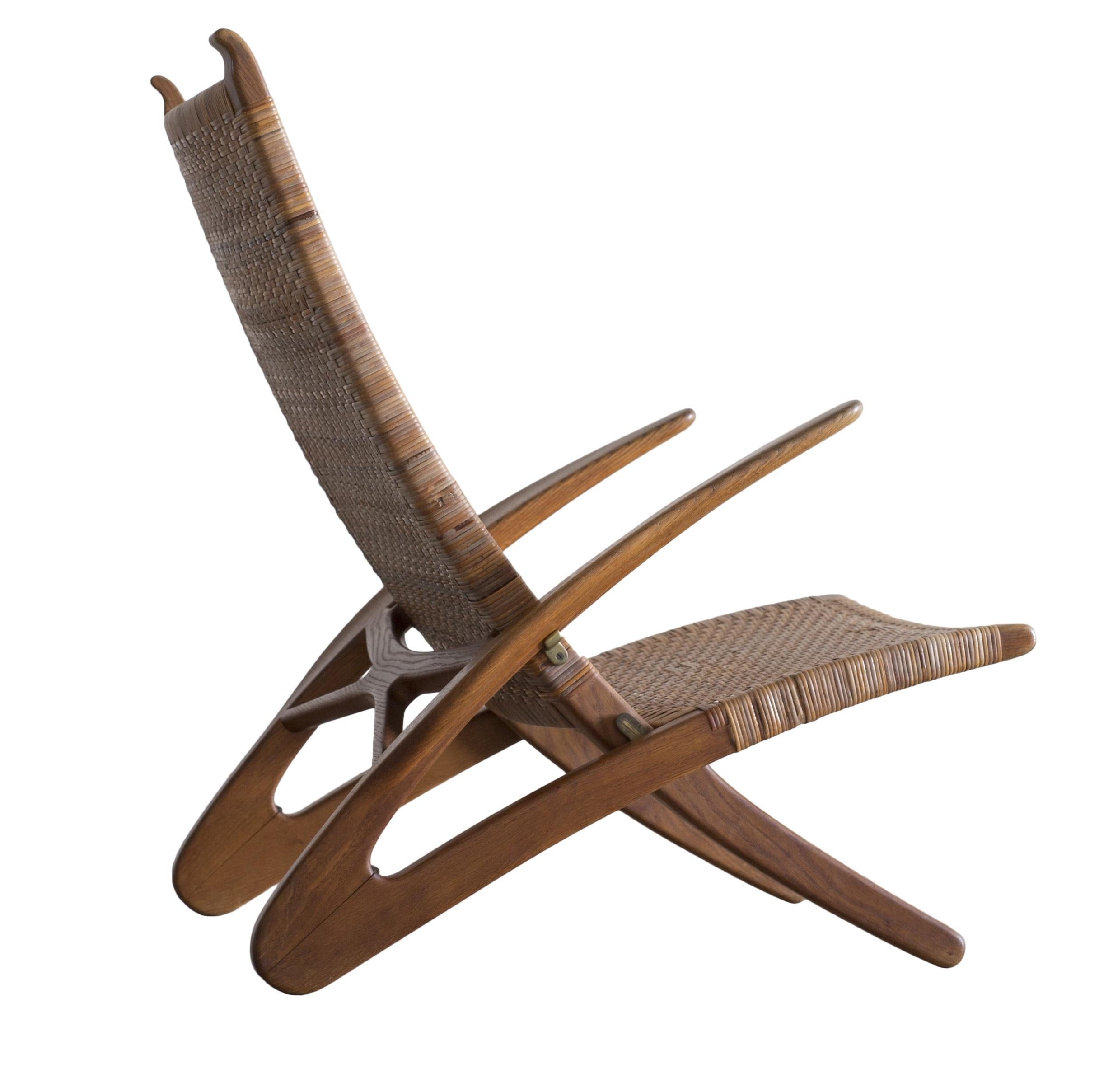 Hans Wegner, “Dolphin Chair”. Rare chair in oak, seat and back with woven cane, brass fittings. Model JH 510. Made for master cabinetmaker Johannes Hansen. Designed 1950.

Littarature:
Literature: Noritsugu Oda: “Hans J. Wegner's 100 Chairs”,