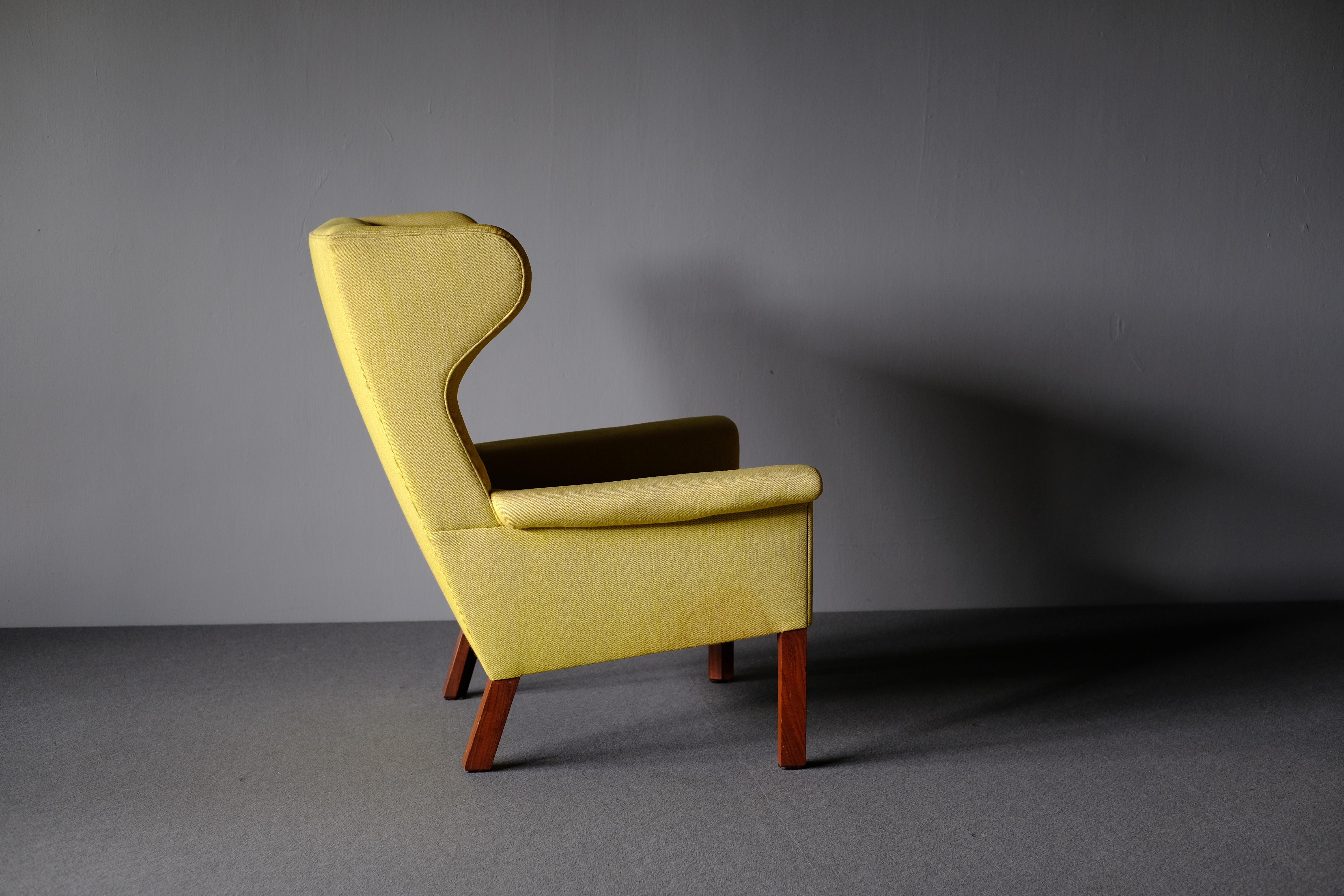 Scandinavian Modern Hans Wegner, Rare Wingback Chair with Mahogany frame by AP Stolen For Sale