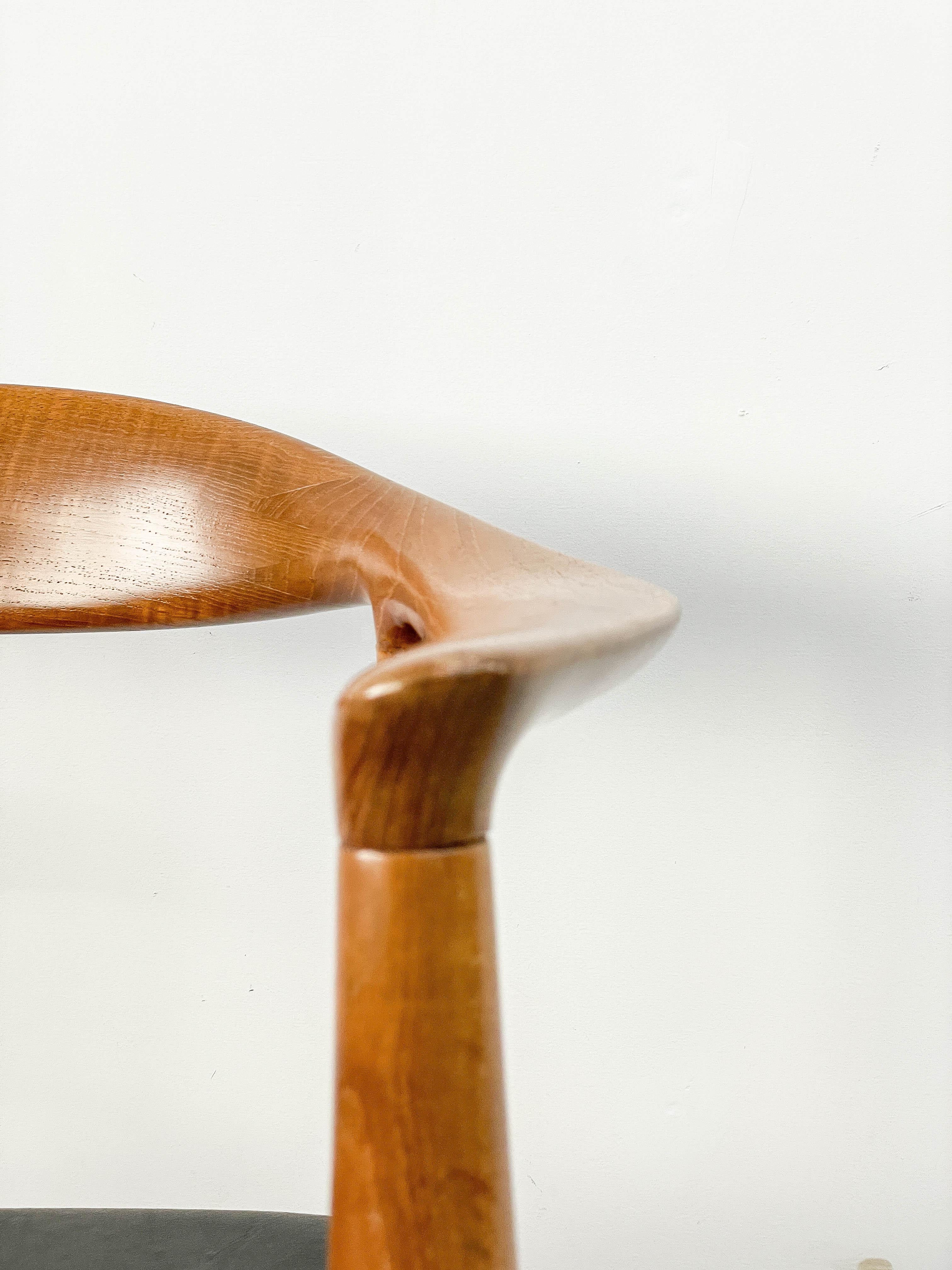 Authentic vintage Hans Wegner JH 503 in teak made by Johannes Hansen and sold by Georg Jensen. Known by many names, ‘The Chair’, The Round One’ and the 'Kennedy Chair'. Made famous in 1960 when Richard Nixon and John F. Kennedy sat in these chairs