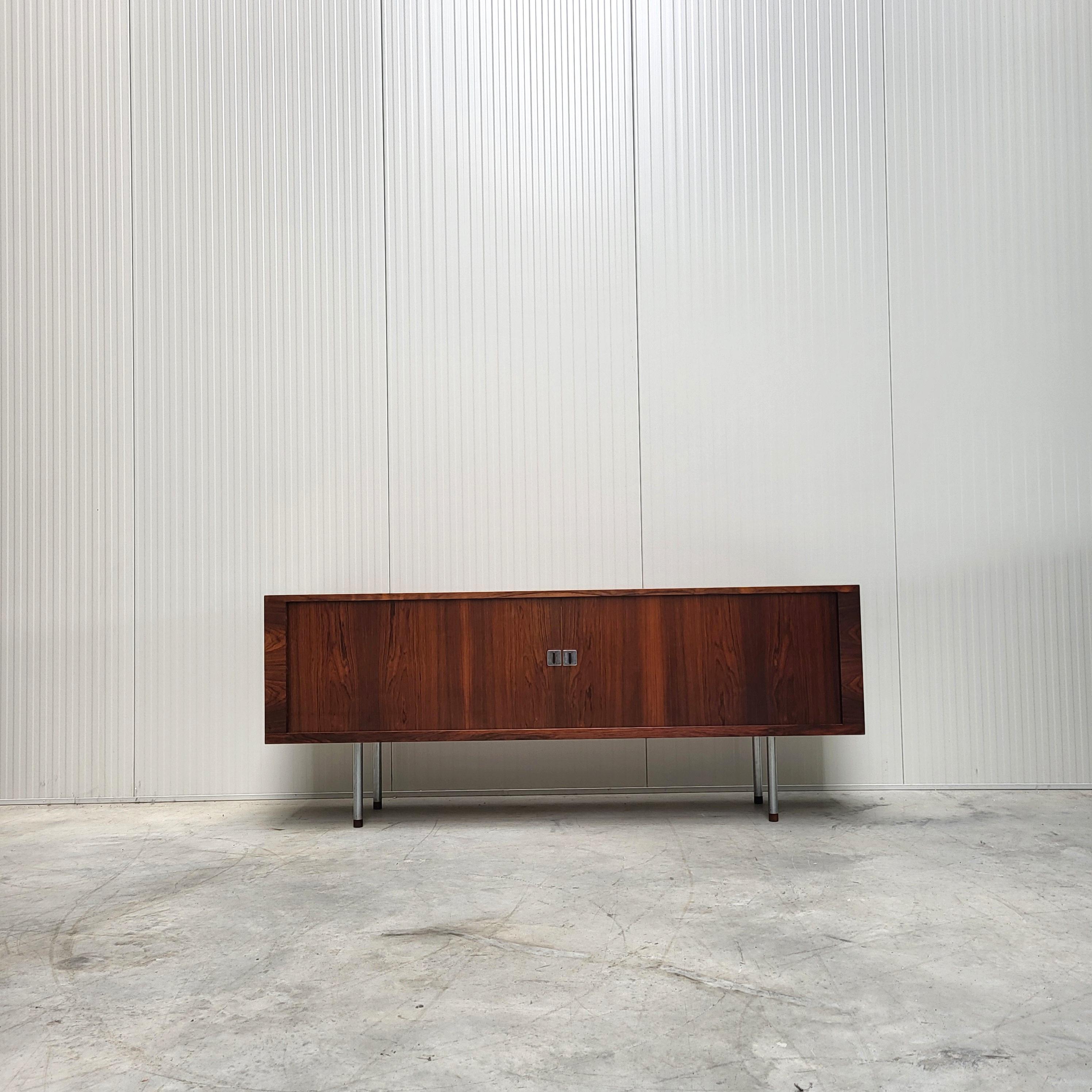 Rare RY25 midcentury sideboard by Hans Wegner for RY Mobler.
Made in Denmark in the late 60s/ early 70s.

This sideboard is one of the best sideboards made in the midcentury period.
RY Mobler was one of the finest manufacturer for high end
