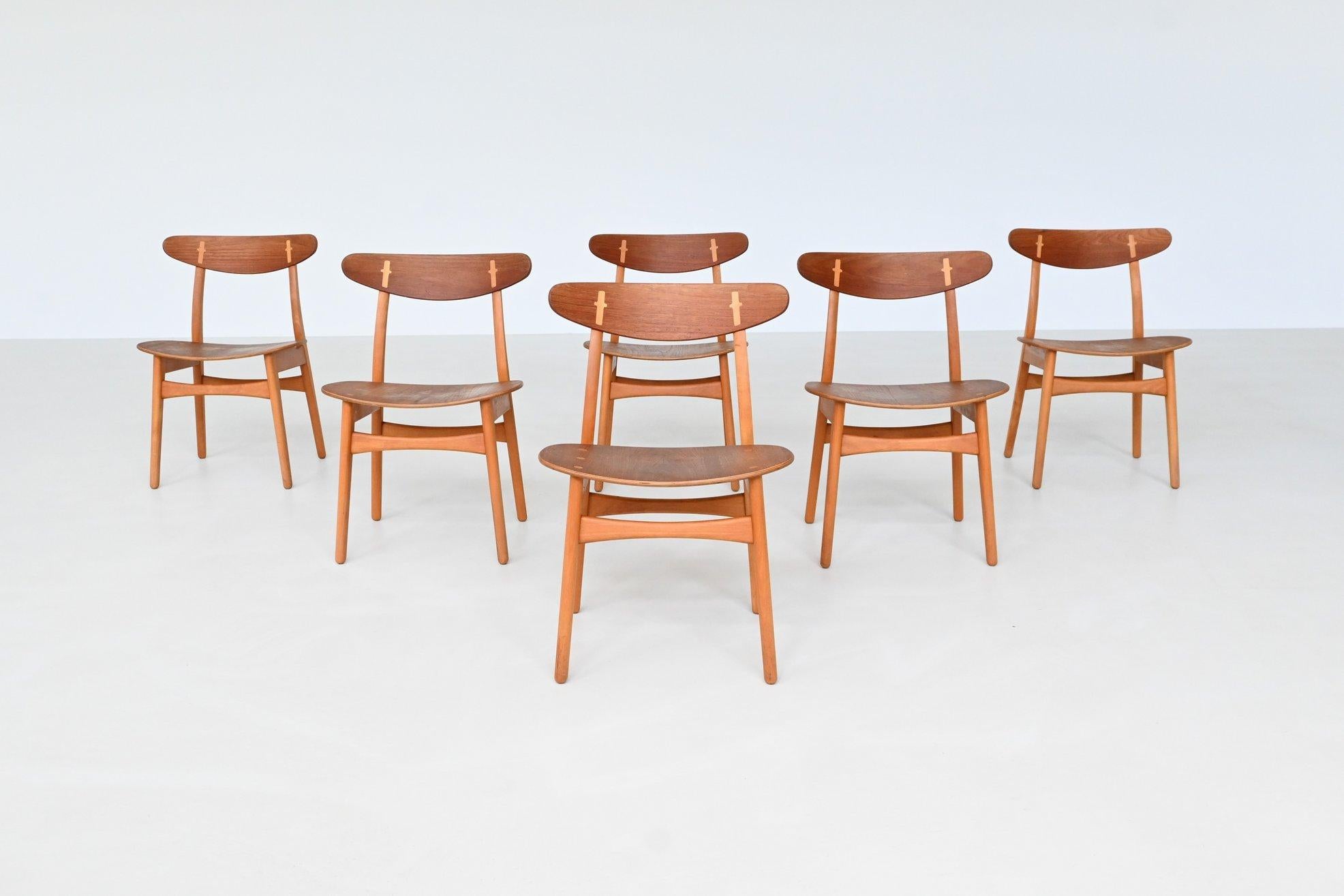 Iconic set of six CH30 dining chairs designed by Hans J. Wegner for Carl Hansen & Søn, Denmark 1952. This rare early set exemplifies Wegner’s refined vision for modern design through its striking sculptural form and masterful craftsmanship. Executed
