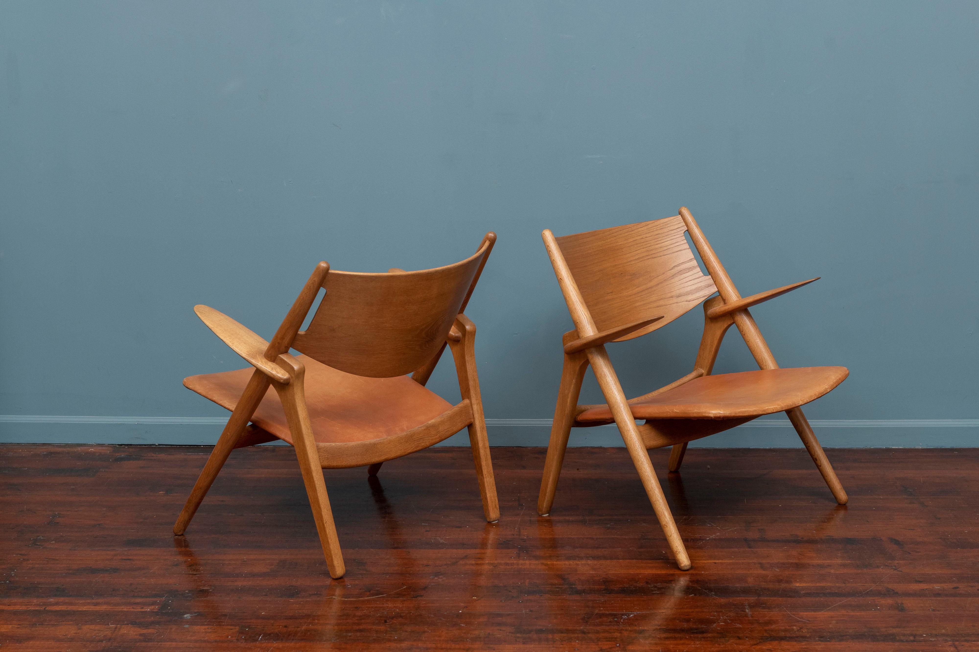 Hans Wegner Sawbuck Lounge Chairs, Model CH-28 for Carl Hanson and Son In Good Condition In San Francisco, CA