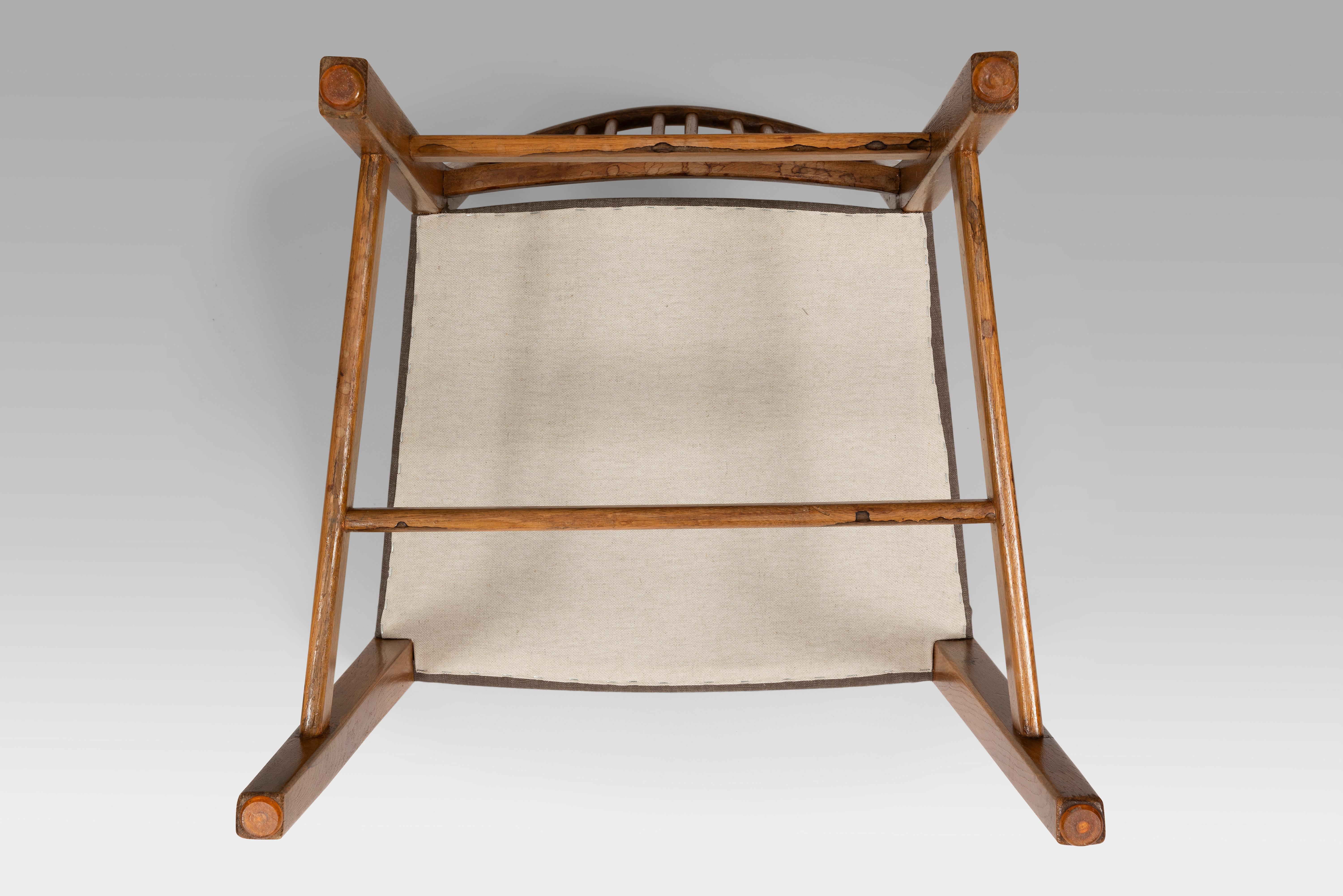 Hans Wegner set of 6 spindle back model 101 hand carved oak chairs, 1950's In Good Condition In Uccle, BE