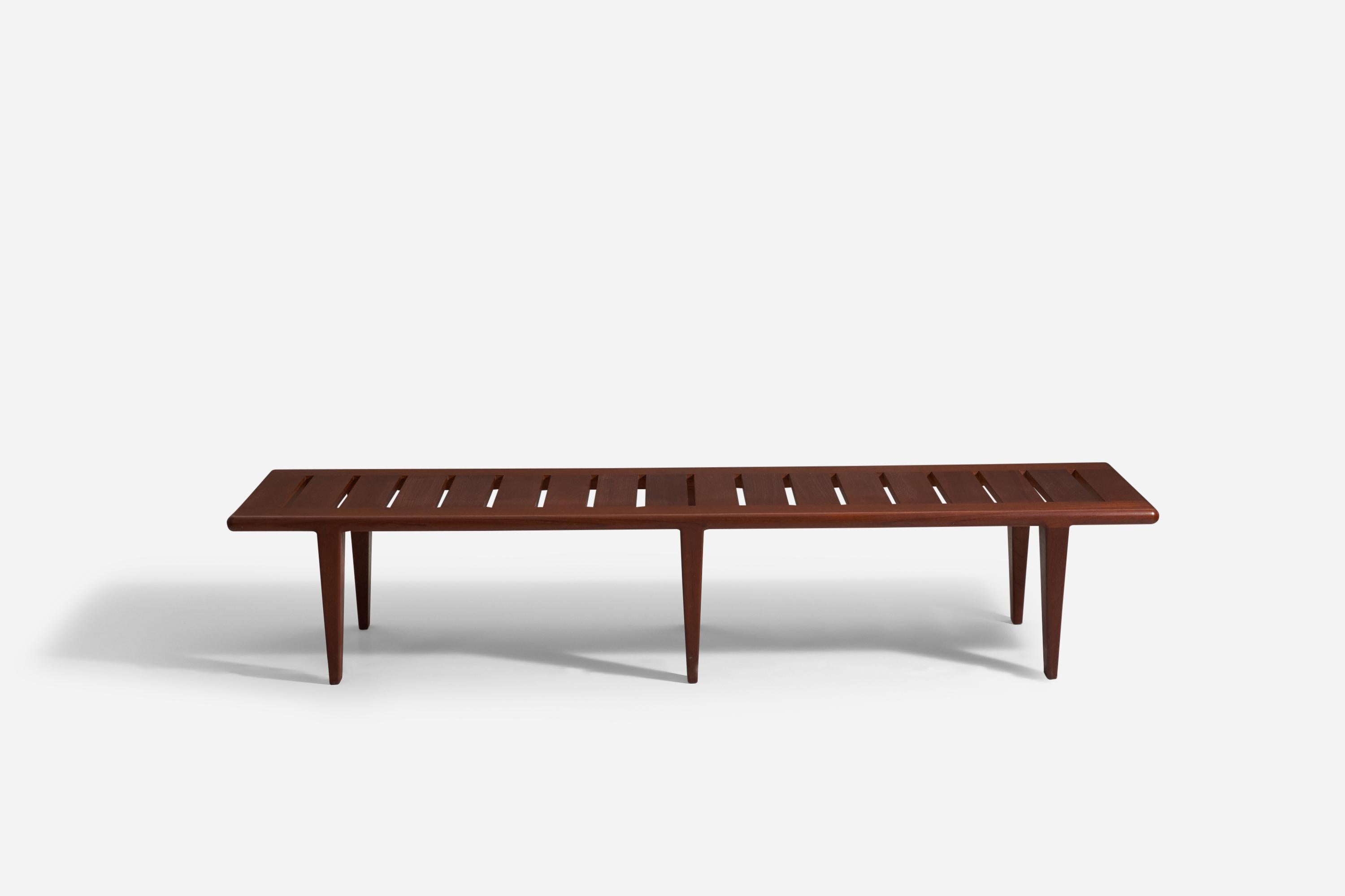 A bench designed by Hans Wegner, produced by cabinet maker Johannes Hansen. In solid teak. With makers metal plaque to underside of bench.

Wegner worked contemporary to designers such as Finn Juhl, Edvard and Tove Kindt-Larsen, Peder Moos, and