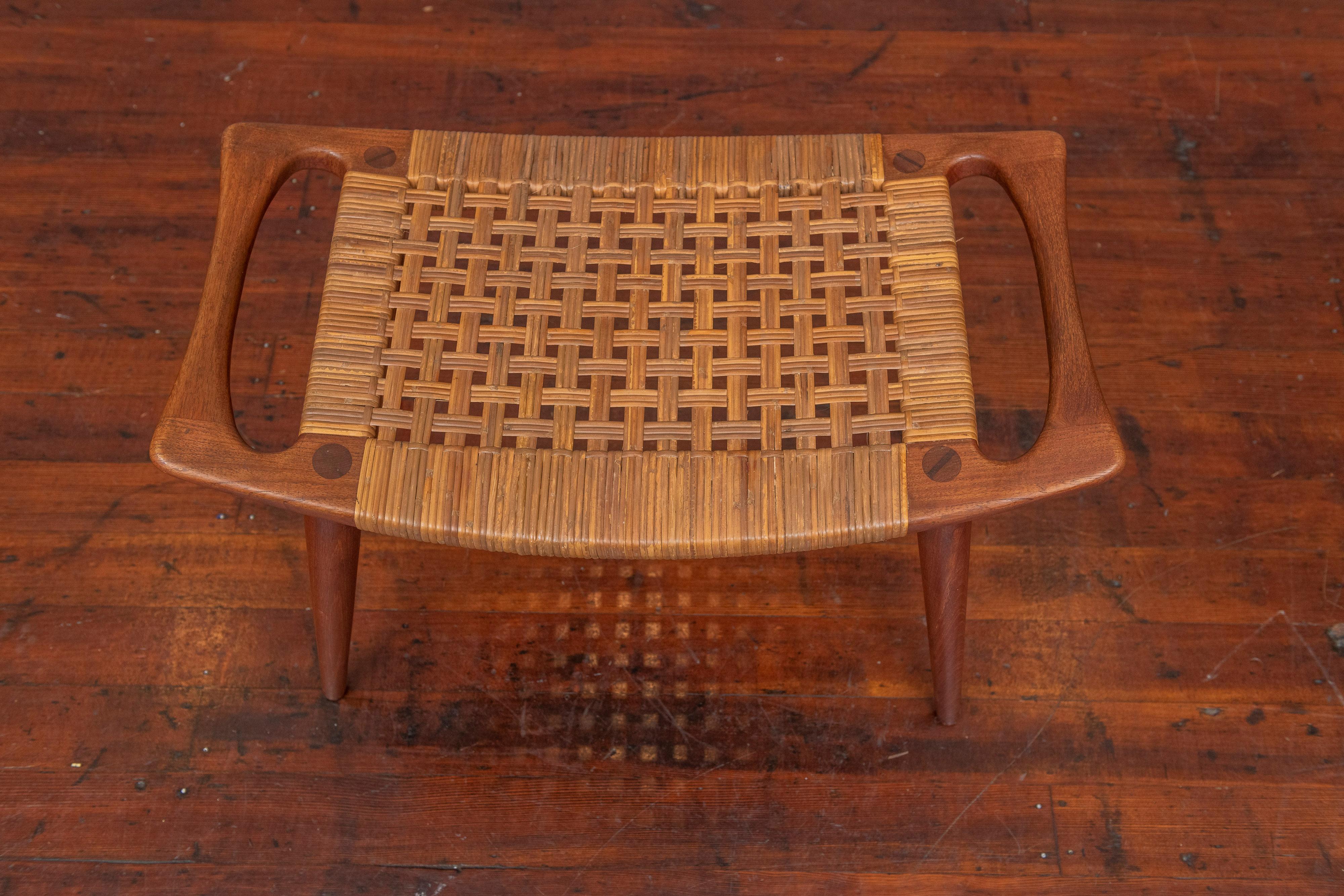 Hans Wegner design teak and cane stool or bench for Johannes Hansen Model JH539, Denmark. Very nice original condition examples of this simple yet elegant bench or stool. High quality construction and attention to details ready to be enjoyed,