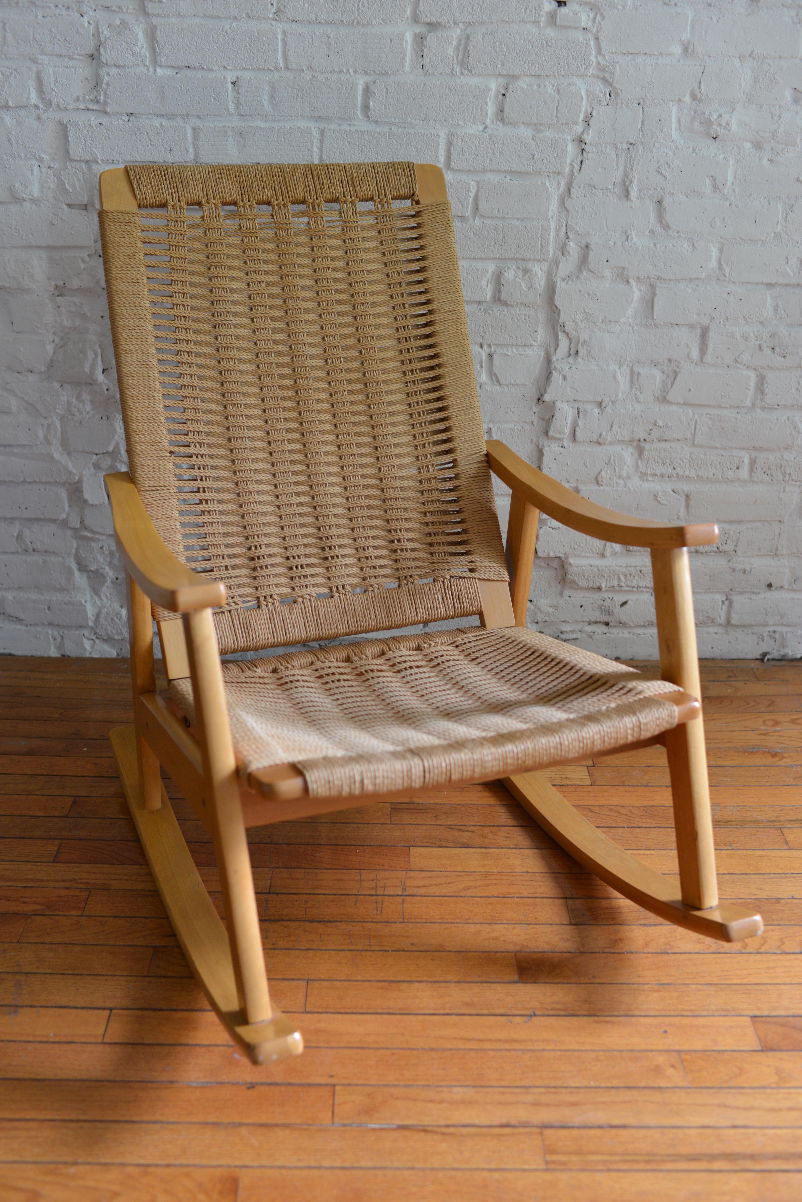 Classic twisted rope mid-century modern rocking chair. Designed in the style of Hans Wegner and made in Yugoslavia. Extremely comfortable and in great condition.

Dimensions: 25 1/2ʺW x 33ʺD x 36ʺH
Time Period/Year: Mid 20th Century 