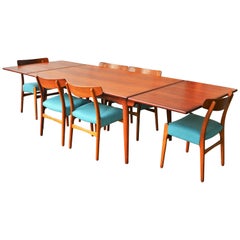 Hans Wegner Teak 312 Dining Table 
6 Teak 
Oak CH23 Dining Chairs in Blue Wool