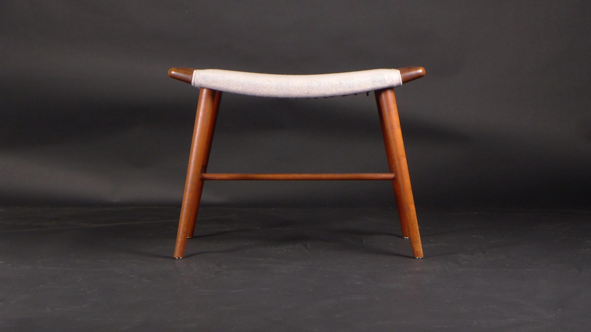 Hans Wegner, Teak Piano Stool, model AP-30, made by A P Stolen, 1950s

Wegner designed this stool as a variation of his ottoman for the Papa Bear chair, to be slightly higher and with a stretcher to give stability and strength.  

Made in