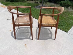 Hans Wegner: „The Chair“, früheres Beispiel: Teakholzsessel, Schilfrohrsessel, Paar