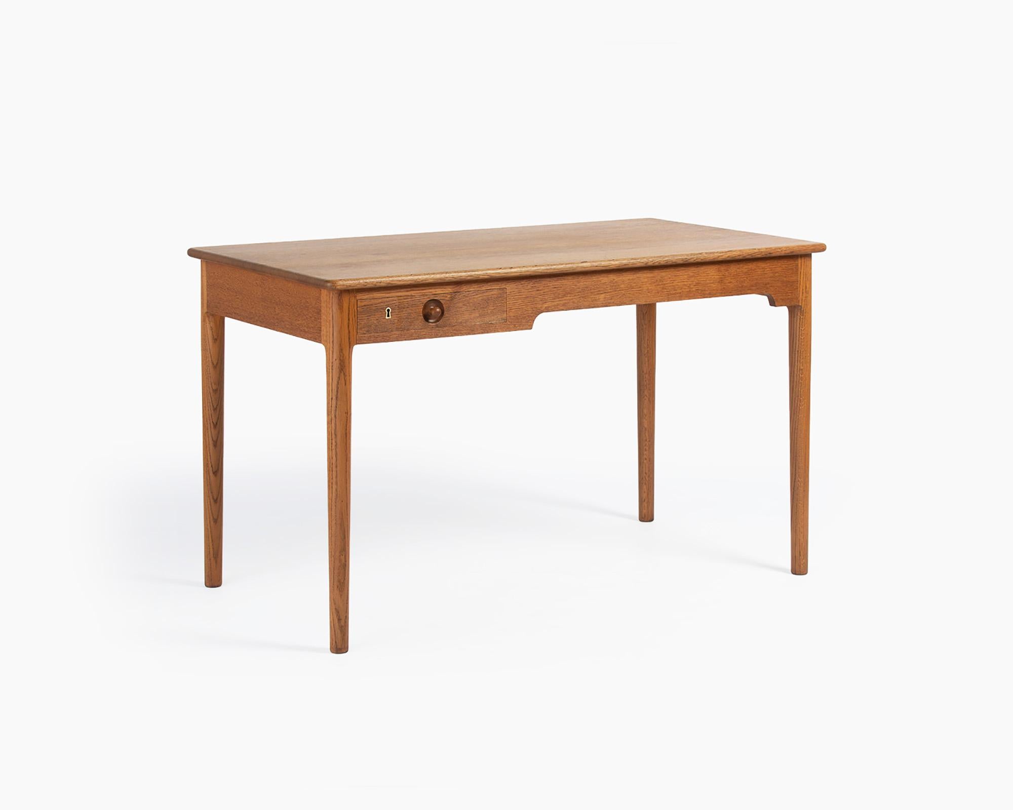 Hans Wegner - PP-312 Desk, c1970s

The Model 312 desk is a variation of Hans Wegner's well-known Model 305 from 1953. Most of Wegner's finest tables were produced by Andreas Tuck at his factory in Odense, Denmark. In the early 1970s Andreas Tuck