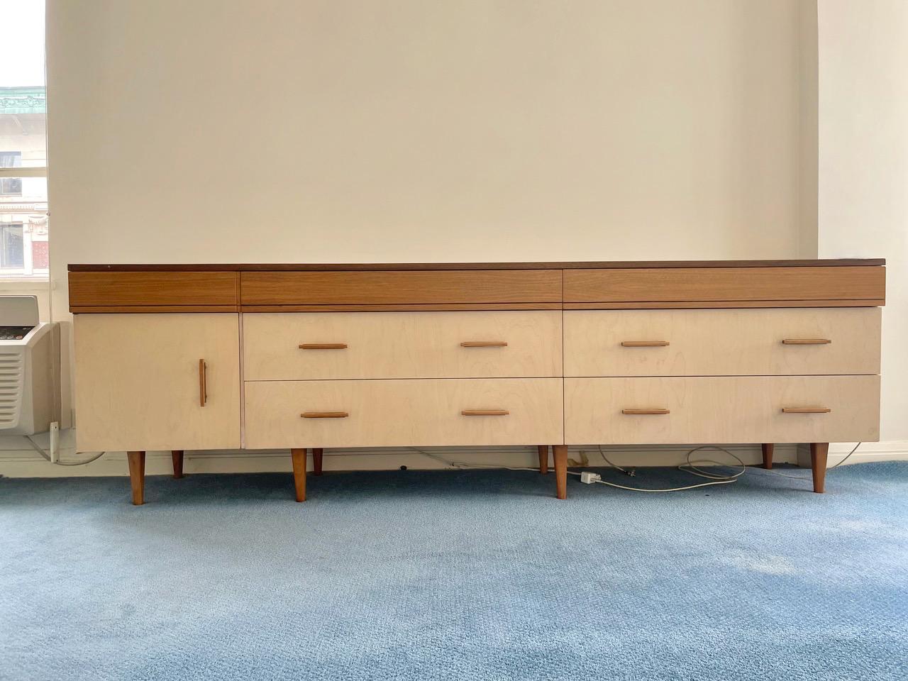 BG GALLERIES SPRING INTO SUMMER SALE

Custom designed and built dresser/chest of drawers by Hans Weiss, New York, 1960 for a an interior design project for a whole apartment.
Top slim drawers with hidden groove for pills are solid walnut. The light