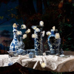 Delftware with frozen flowers by Hans Withoos