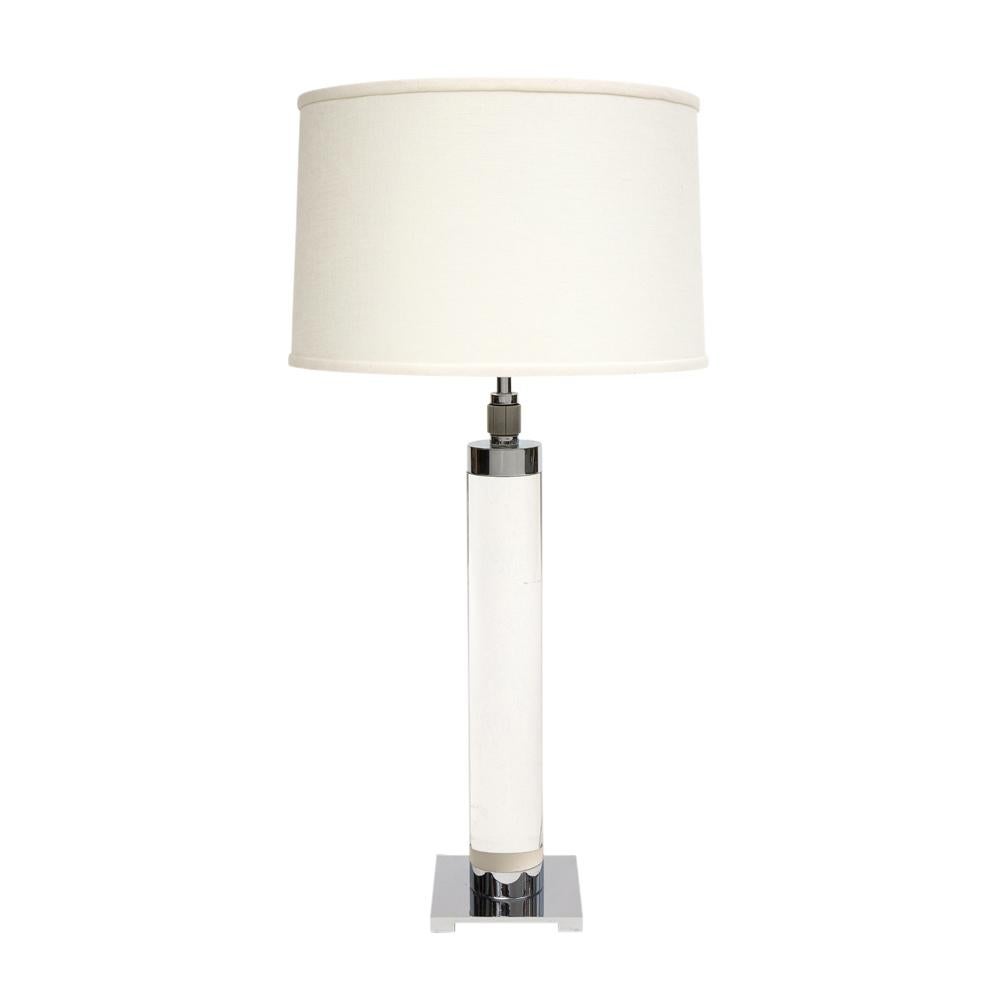 Hansen lamp, acrylic, nickel chrome, signed. High quality slender polished clear acrylic cylinder lamp mounted on a square plated steel base with three original porcelain sockets and Hansen's patented three-way switch. Retains the period factory