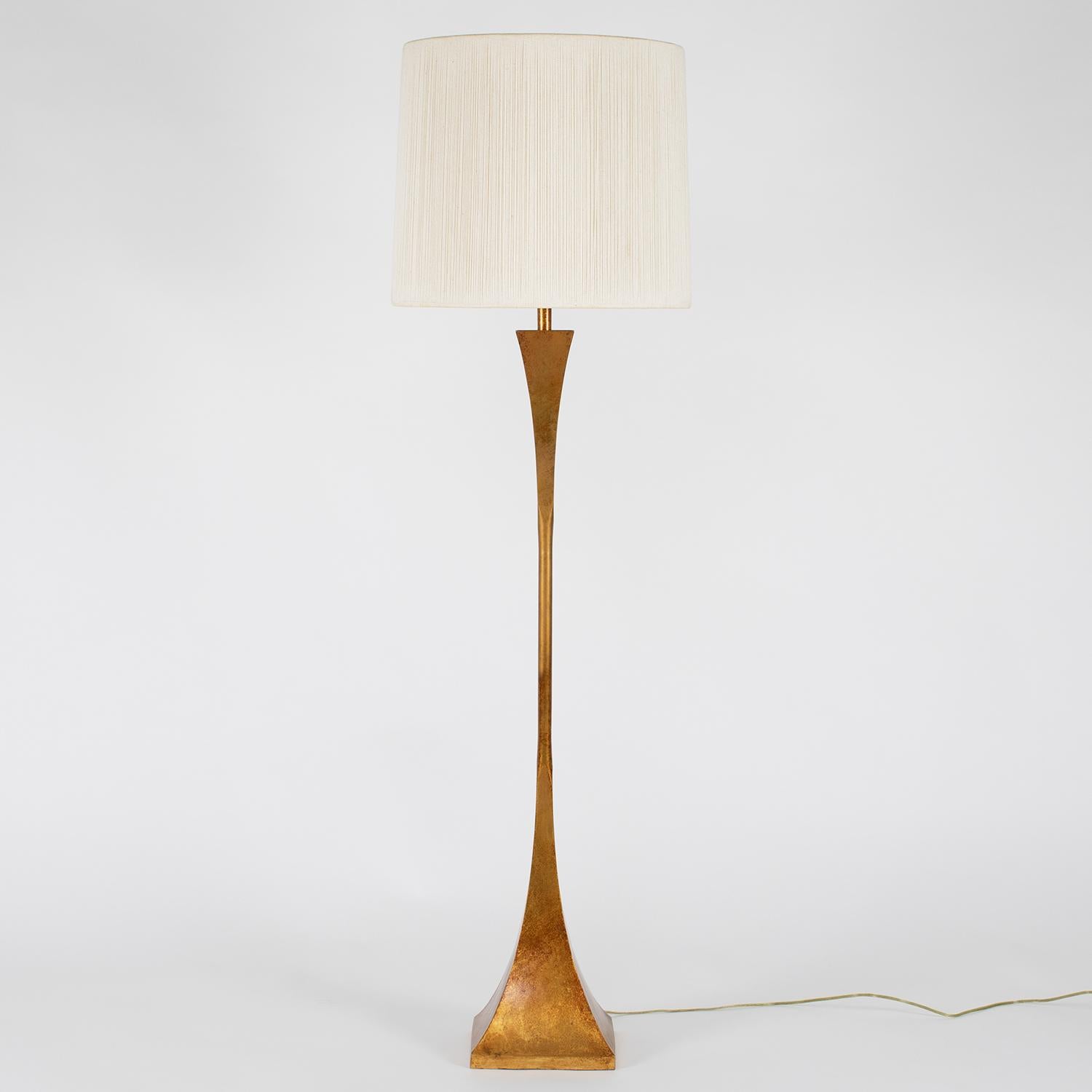 Sculptural floor lamp in gilded bronze with rotating switch at top by Stuart Ross James for Hansen, American, 1960s.

Measures: Shade diameter 16 inches.